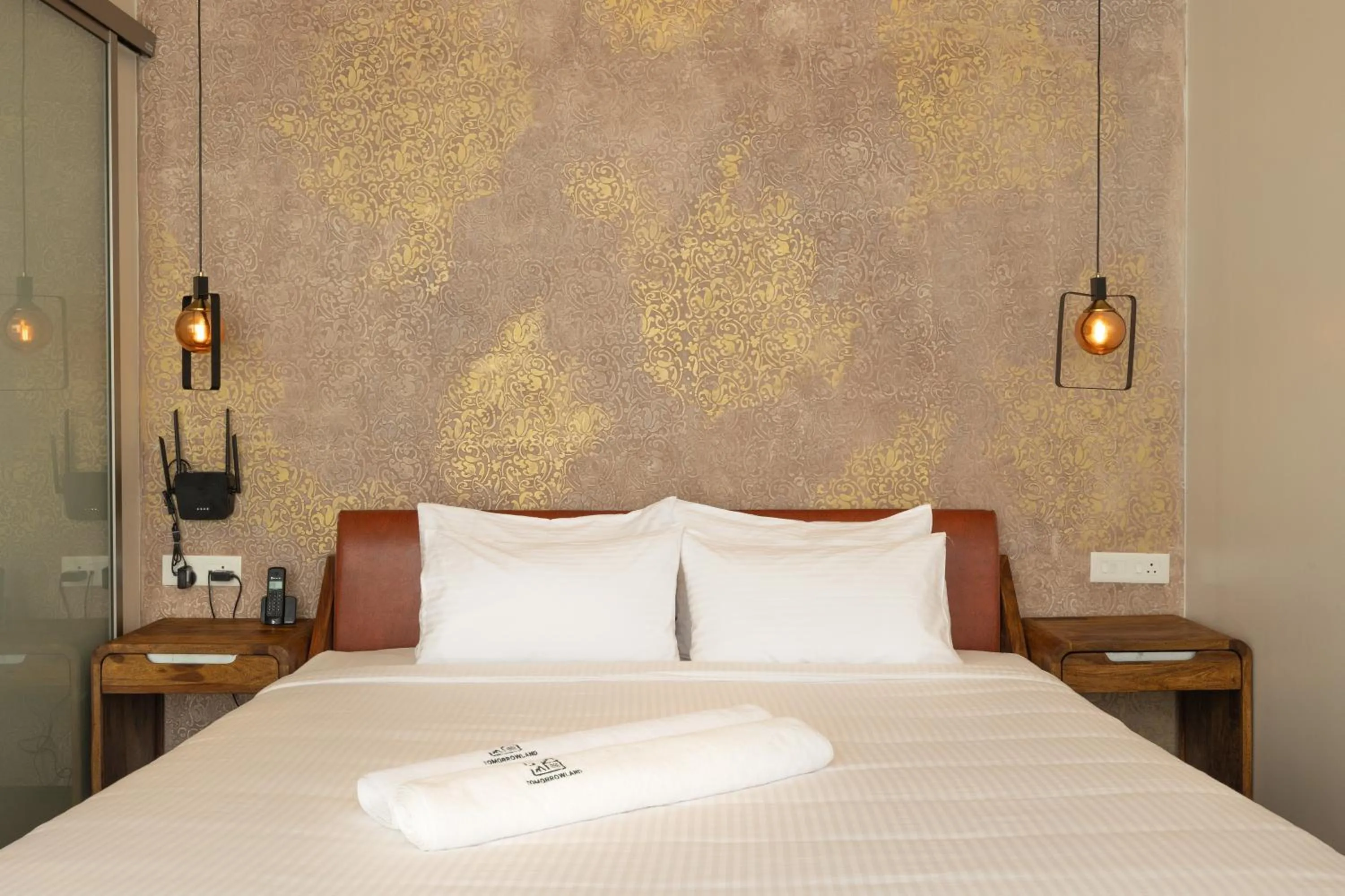 Bed in Tomorrowland Farms and Suites