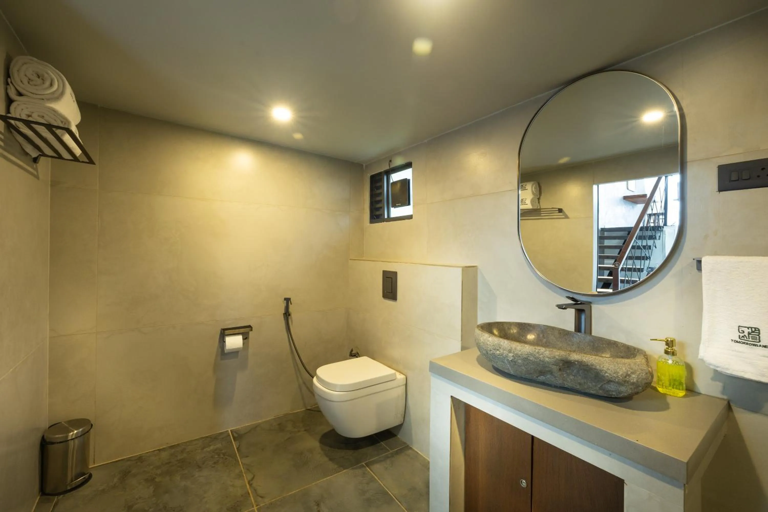 Toilet in Tomorrowland Farms and Suites