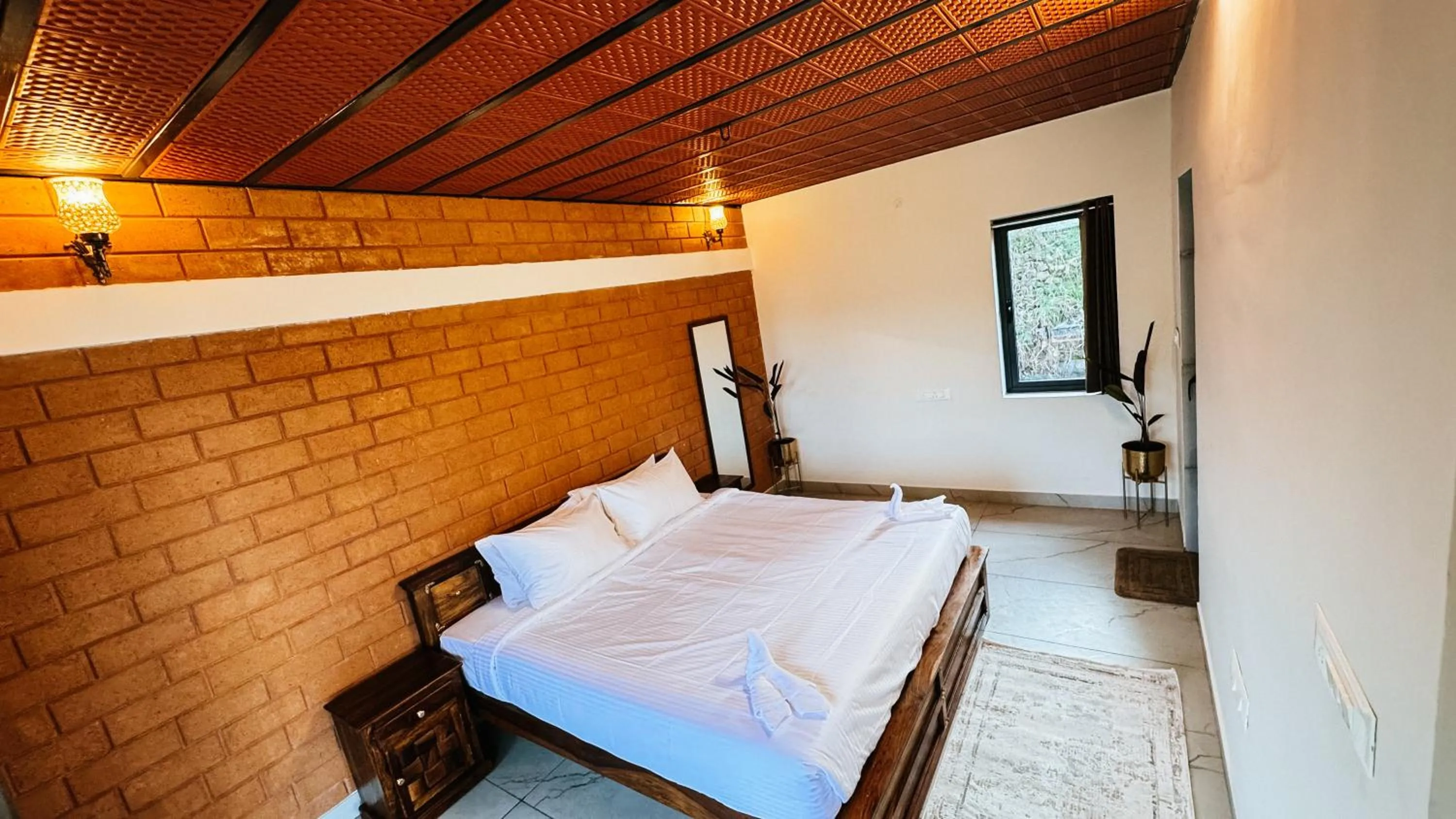 Bathroom, Bed in Tomorrowland Farms and Suites