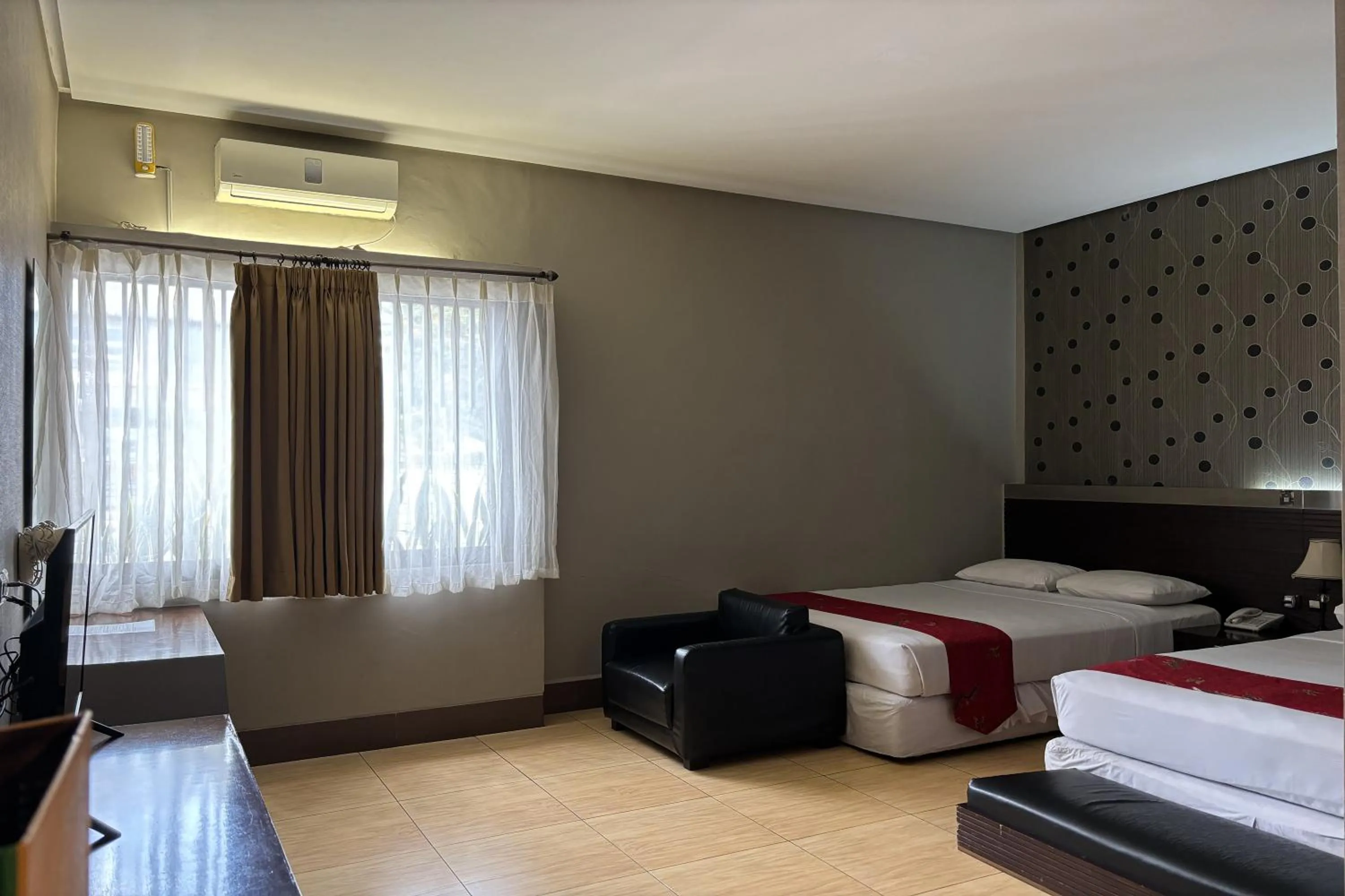 Bed in Hotel Pesona Bamboe Lembang