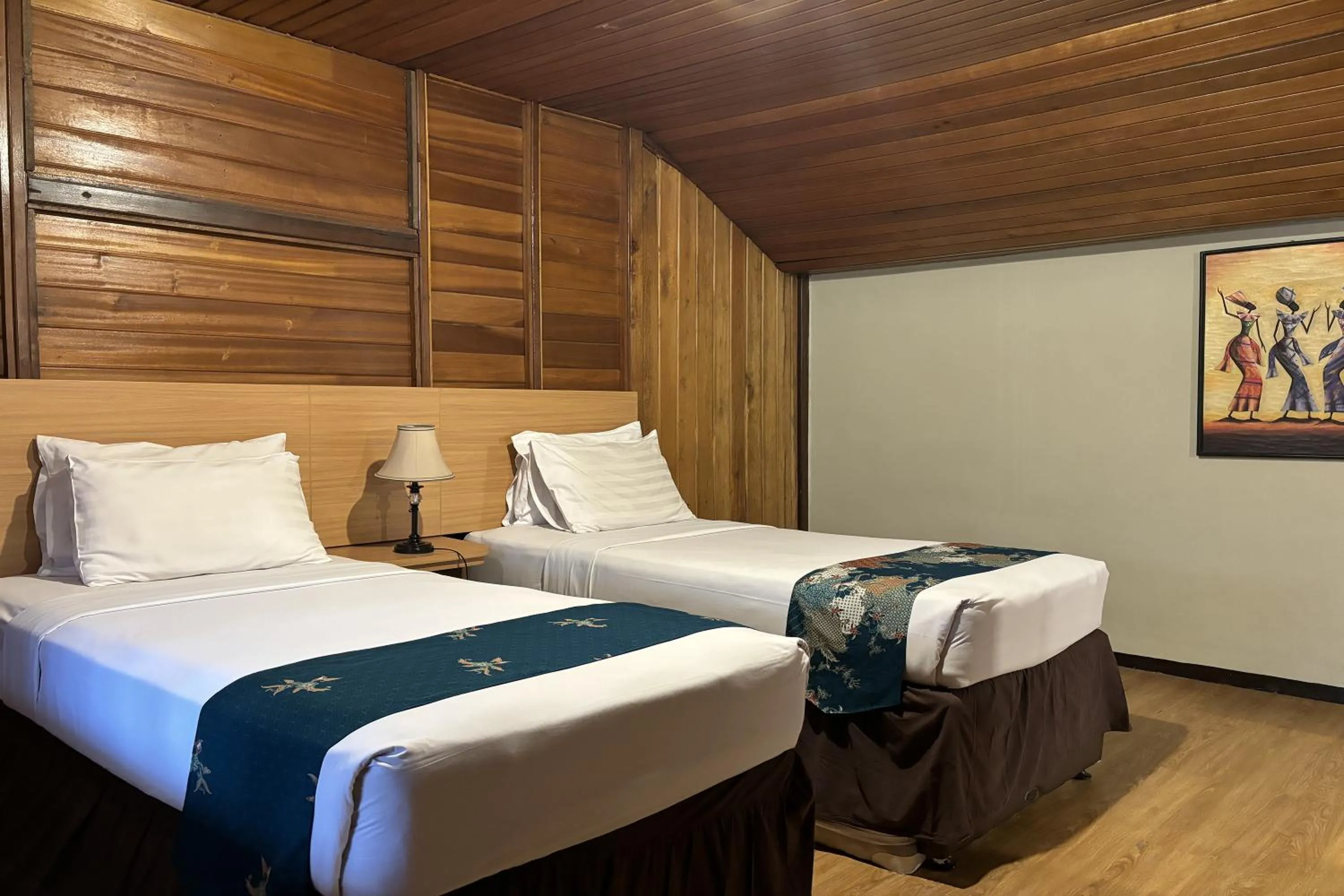 Bed in Hotel Pesona Bamboe Lembang