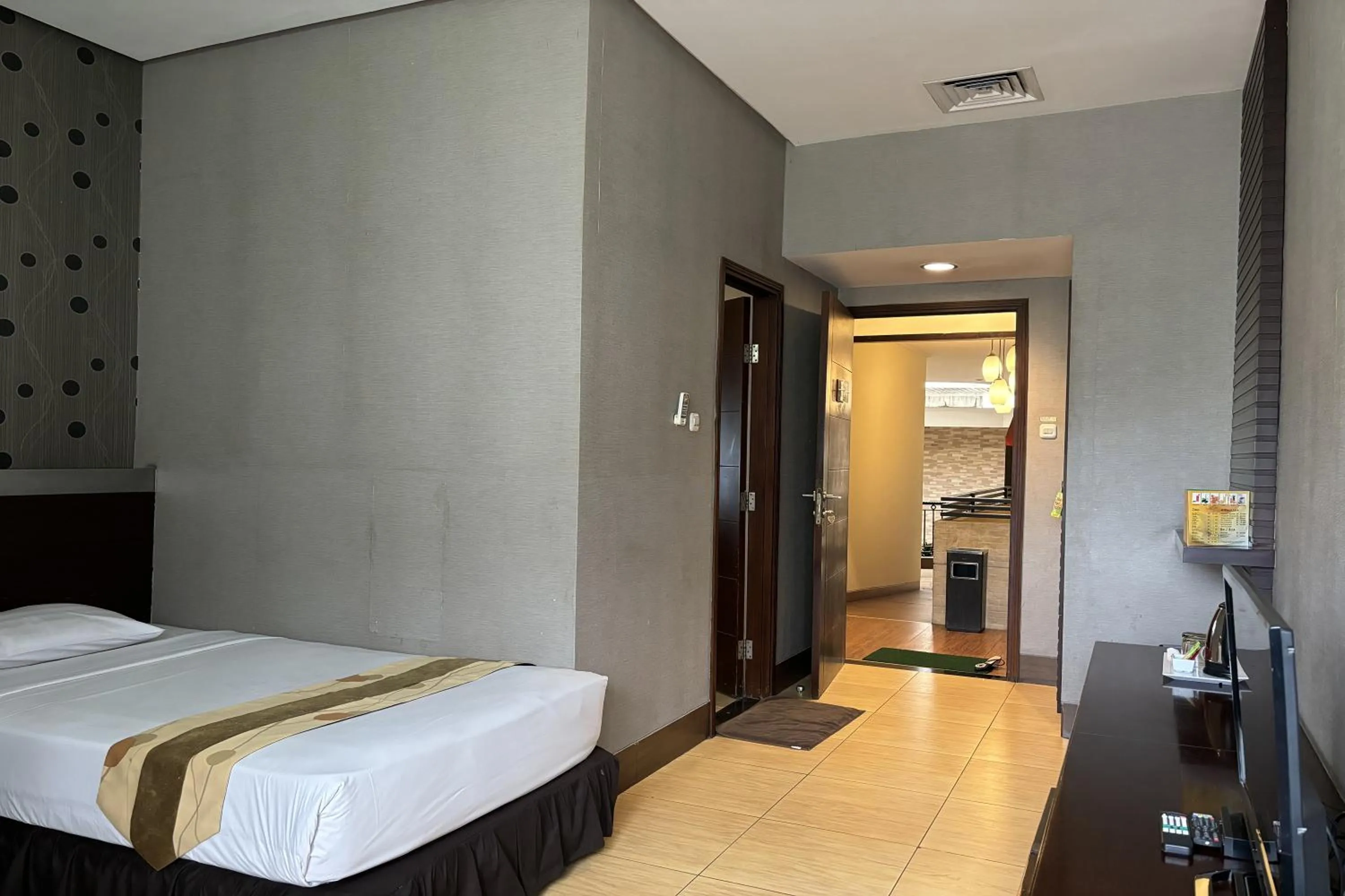 Bed in Hotel Pesona Bamboe Lembang