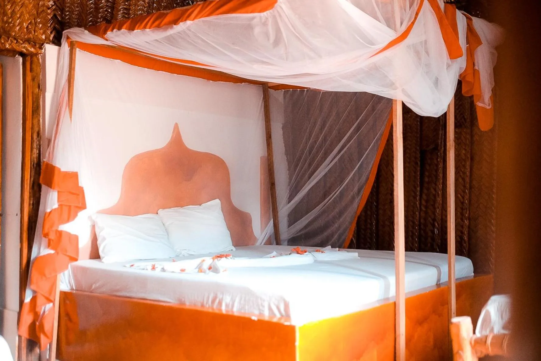 Bed in New Jambo Bungalows