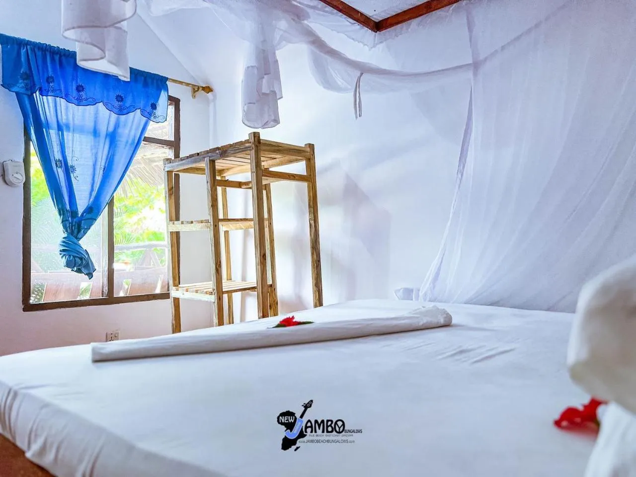 Bed in New Jambo Bungalows