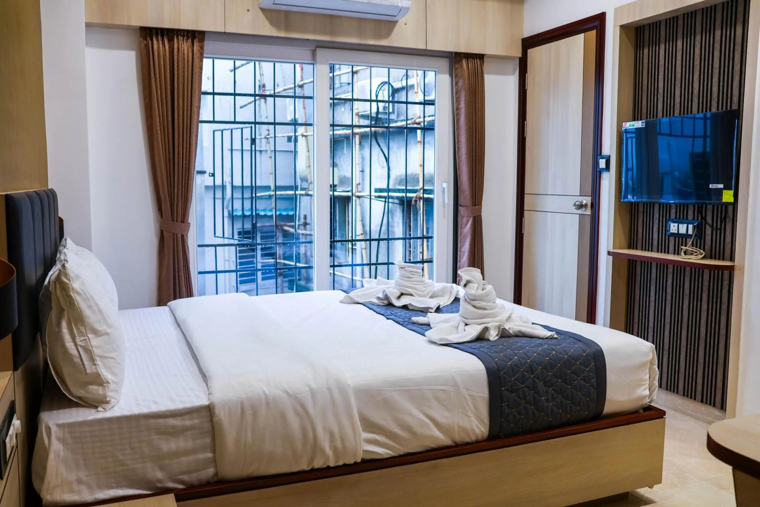 Bed in The Executive Inn