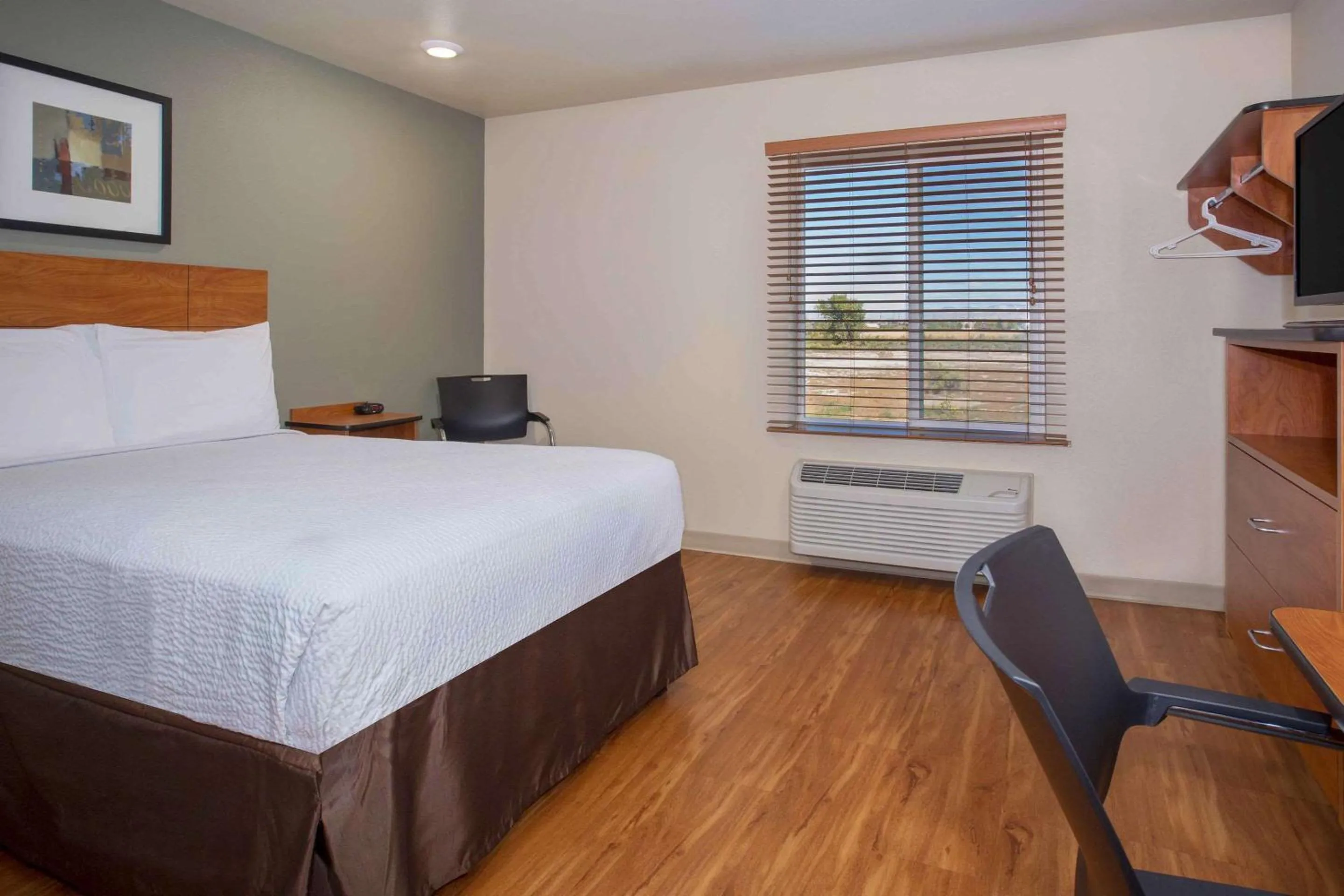 Photo of the whole room, Bed in WoodSpring Suites Grand Junction