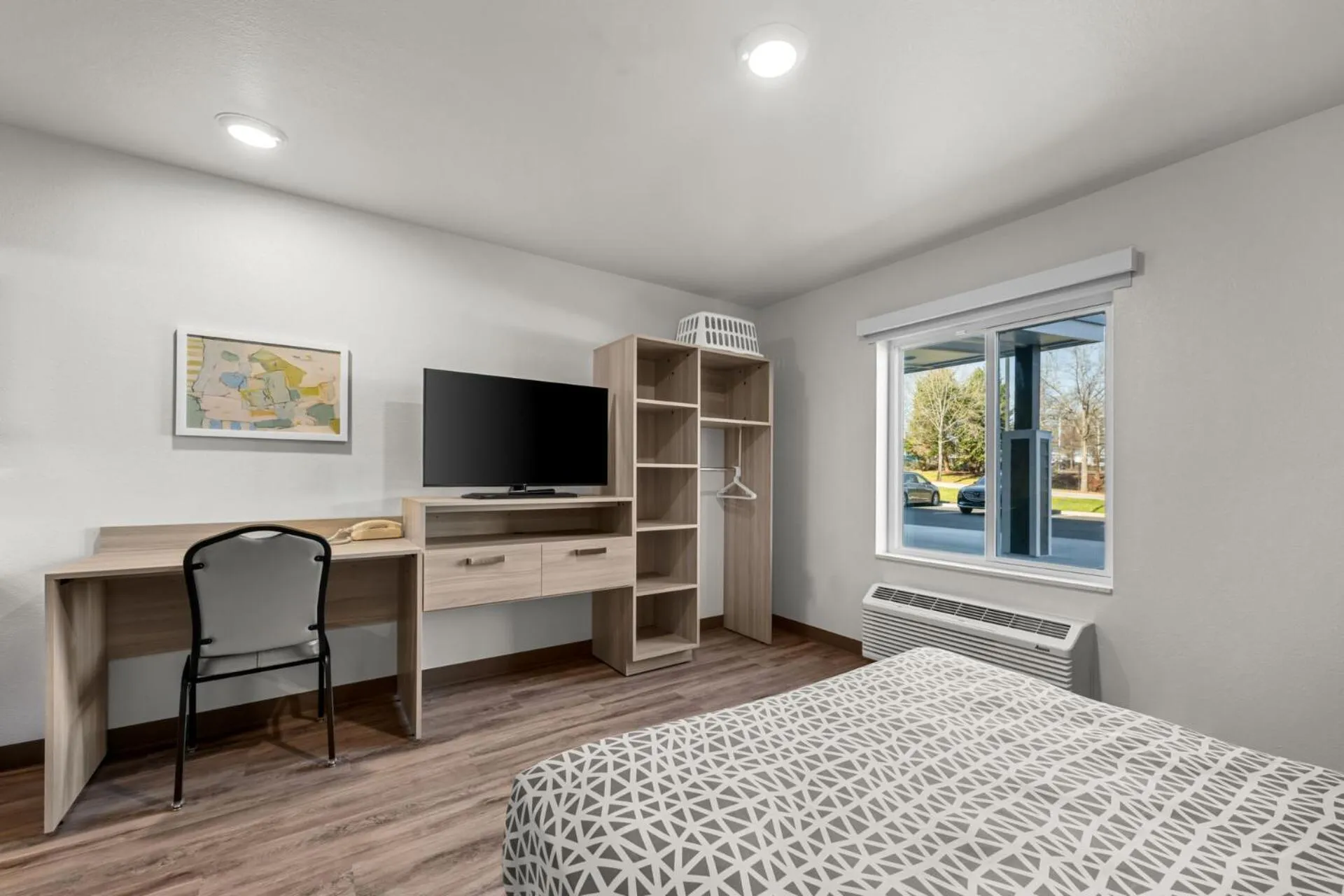 Bed in WoodSpring Suites Lebanon