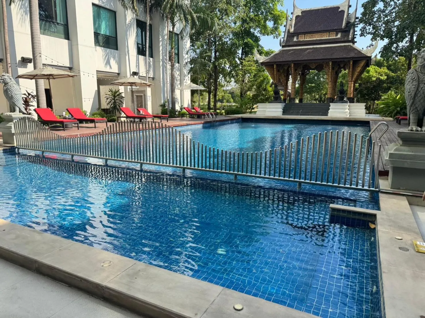 Swimming pool in Mida Grande Hotel Dhavaravati Nakhon Pathom - SHA PLUS