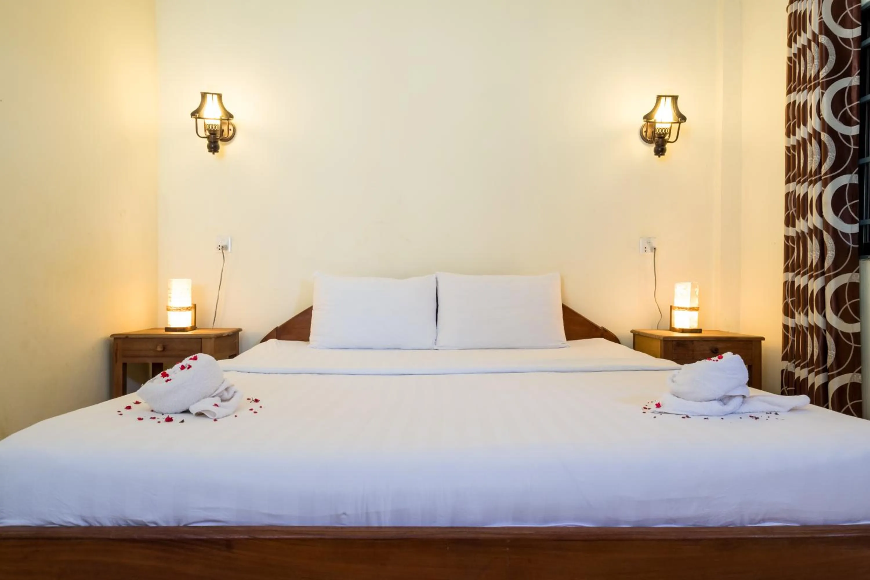 Bed in Kep Bungalows