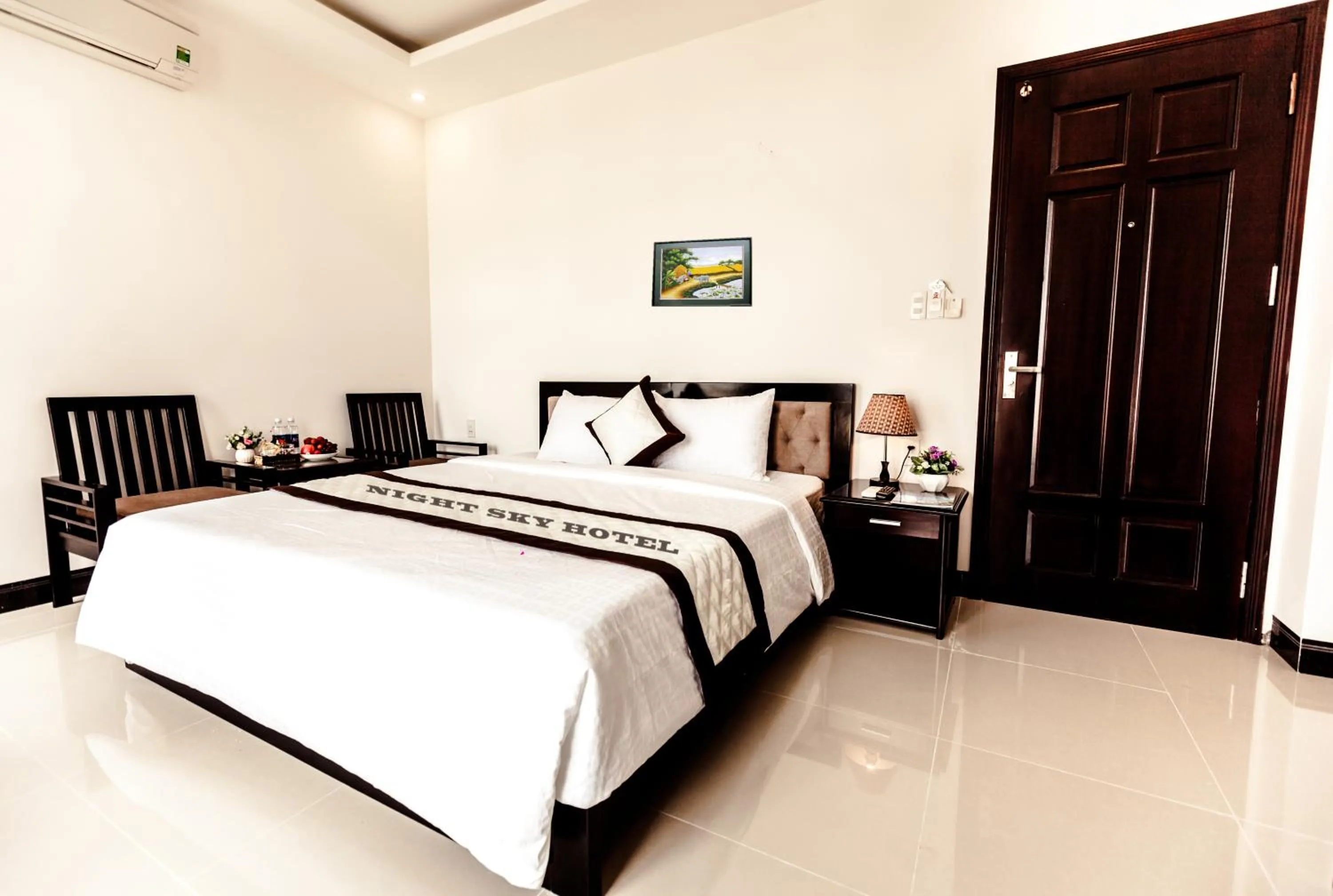 Bed in Night Sky Hotel