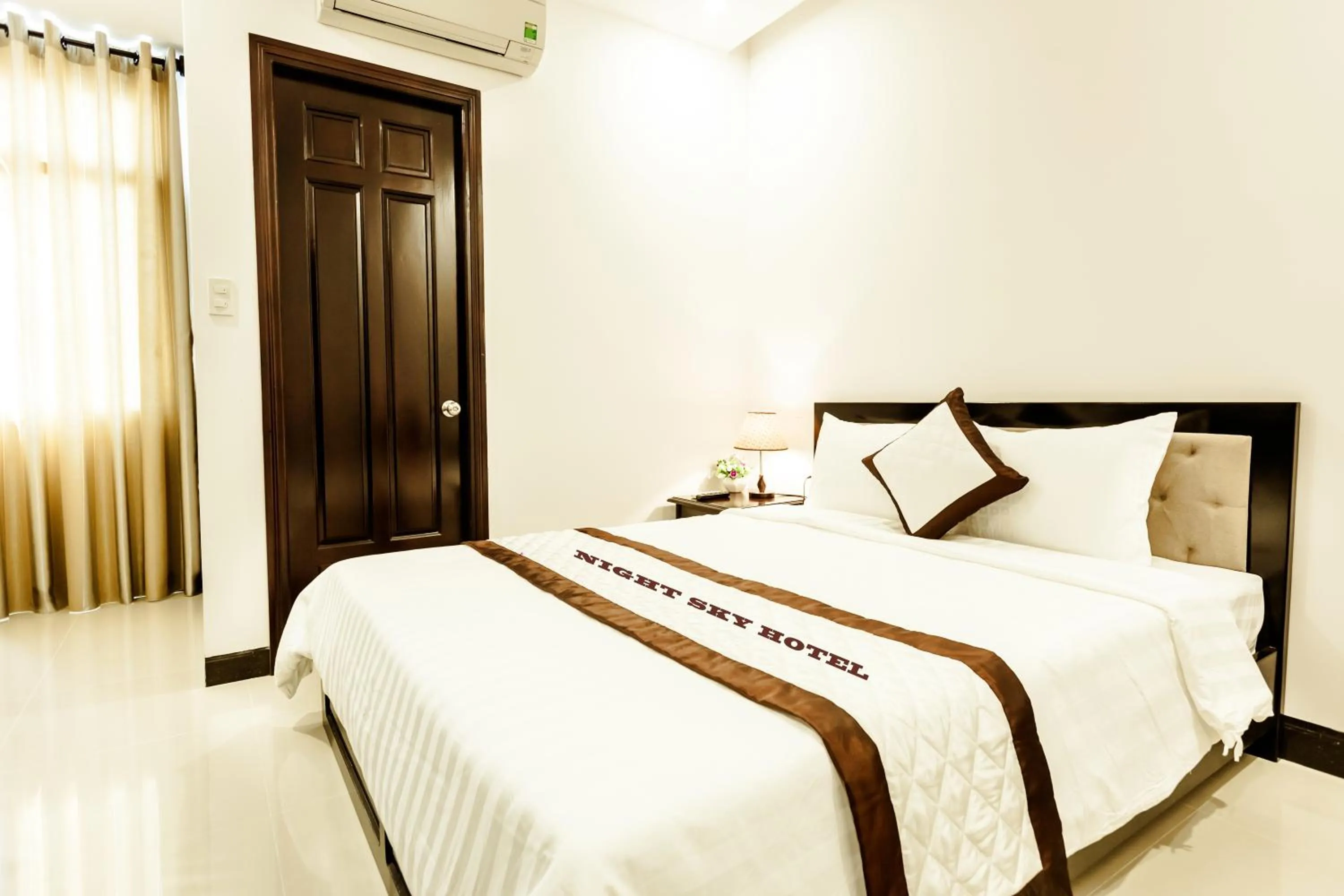 Bed in Night Sky Hotel