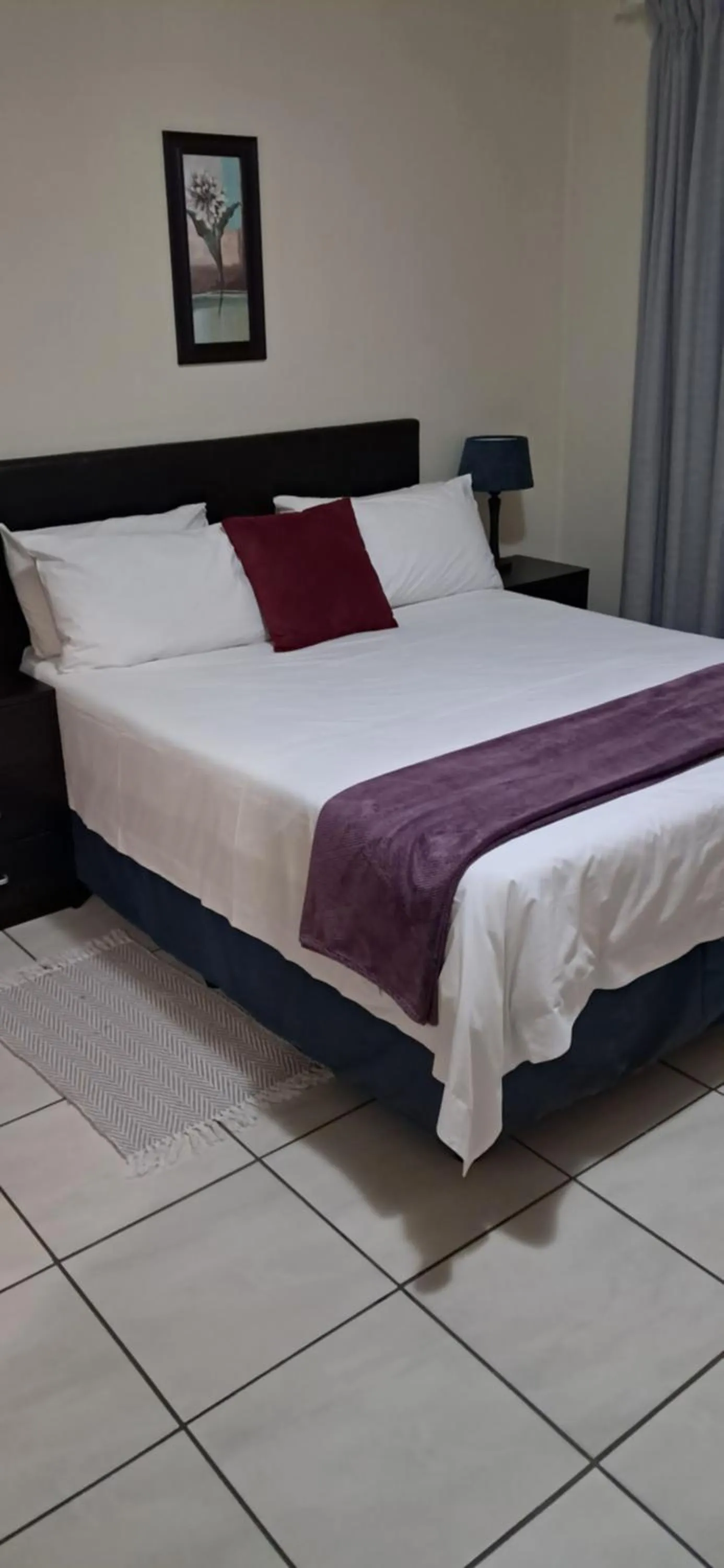 Bed in Sand River Cottages