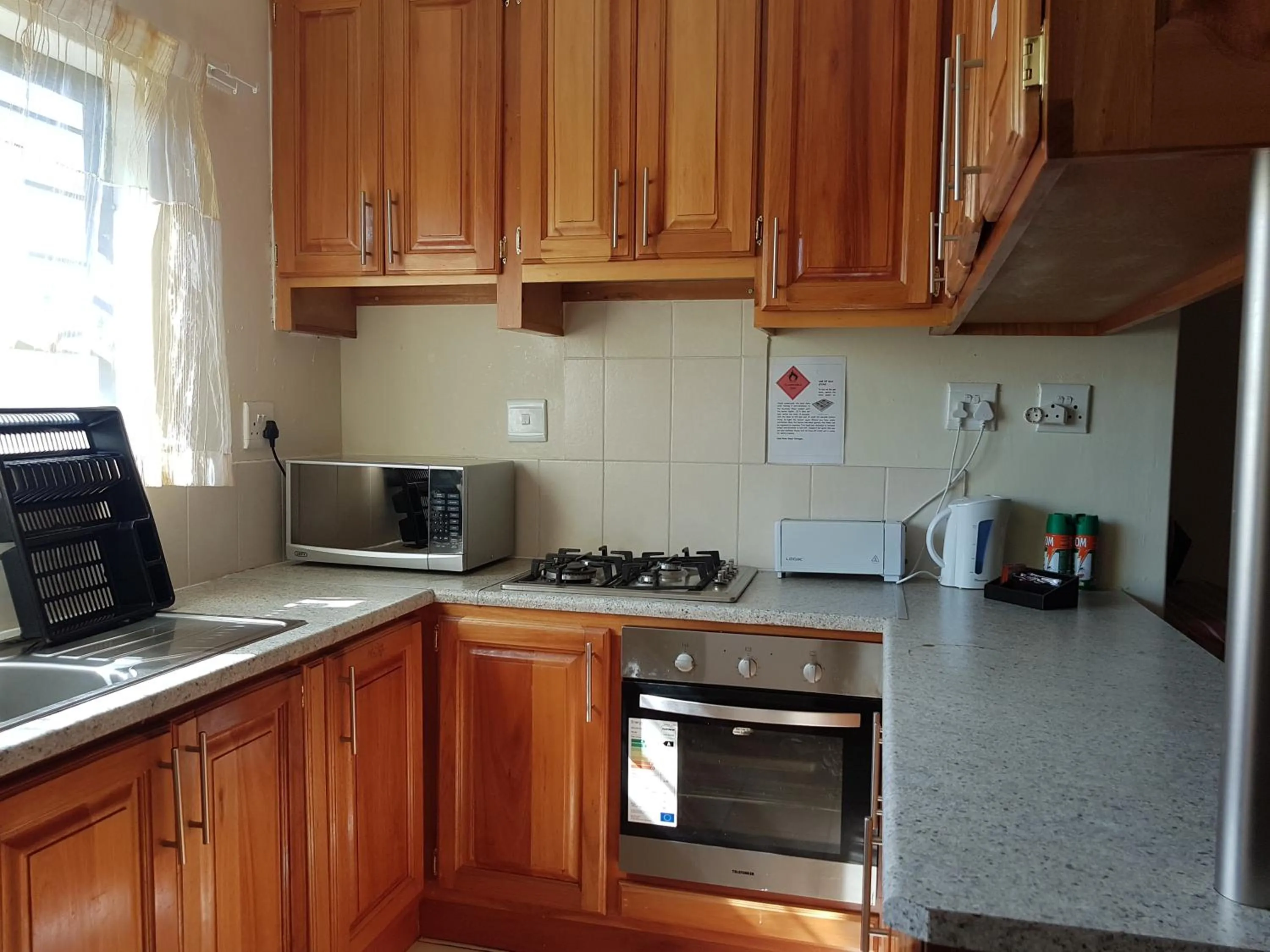 Kitchen or kitchenette in Sand River Cottages