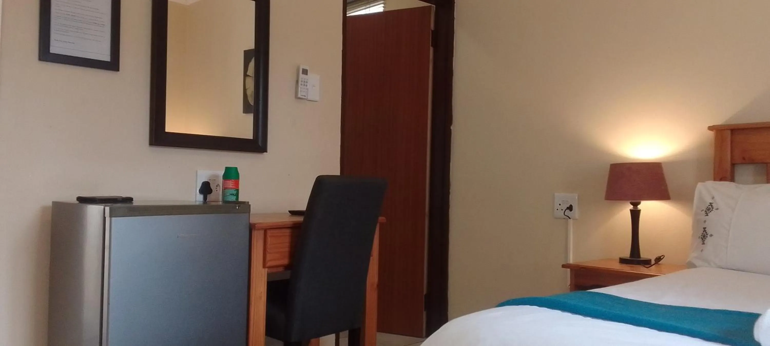 Bed in Sand River Cottages