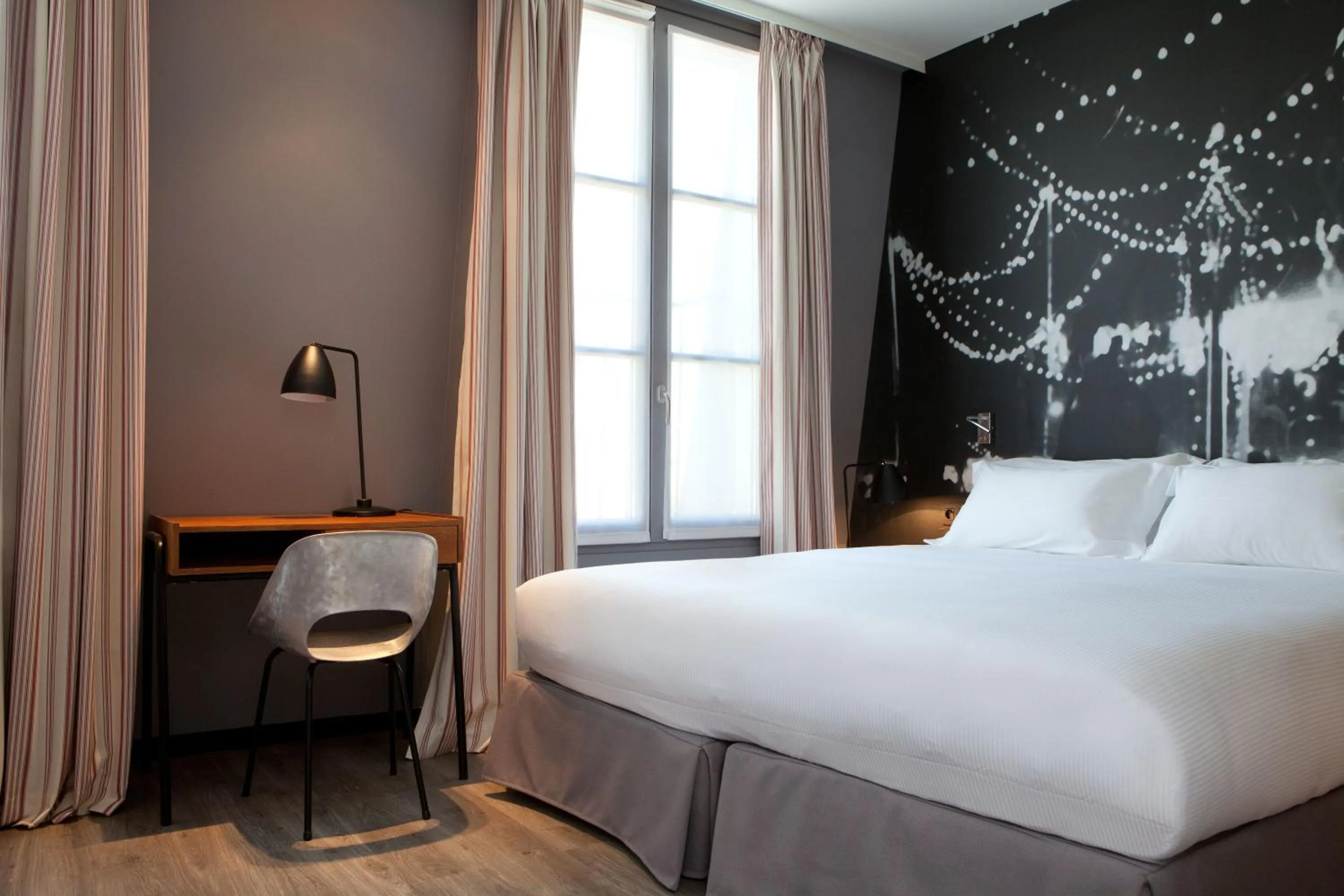 Bed in Hotel L’Antoine