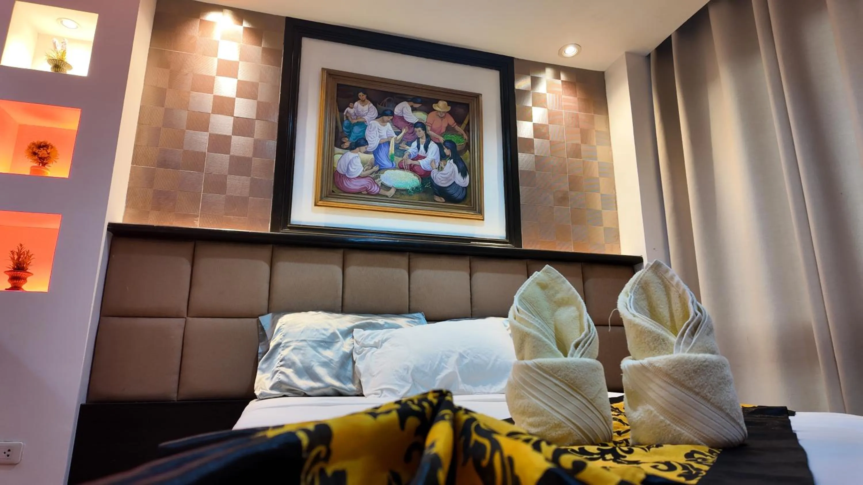 Bed in Kay Hotel and Residences