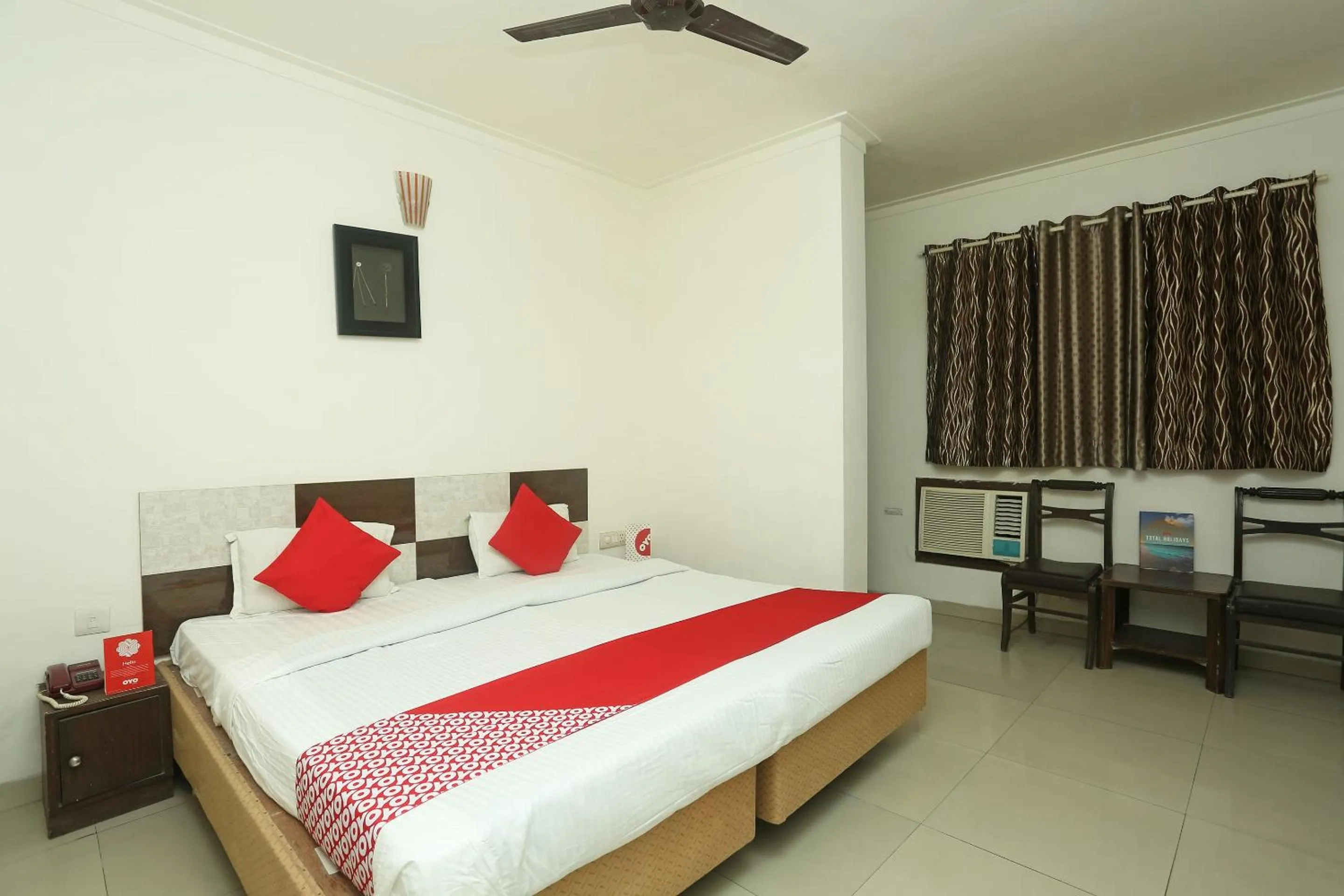 Bedroom in Hotel O Sai President