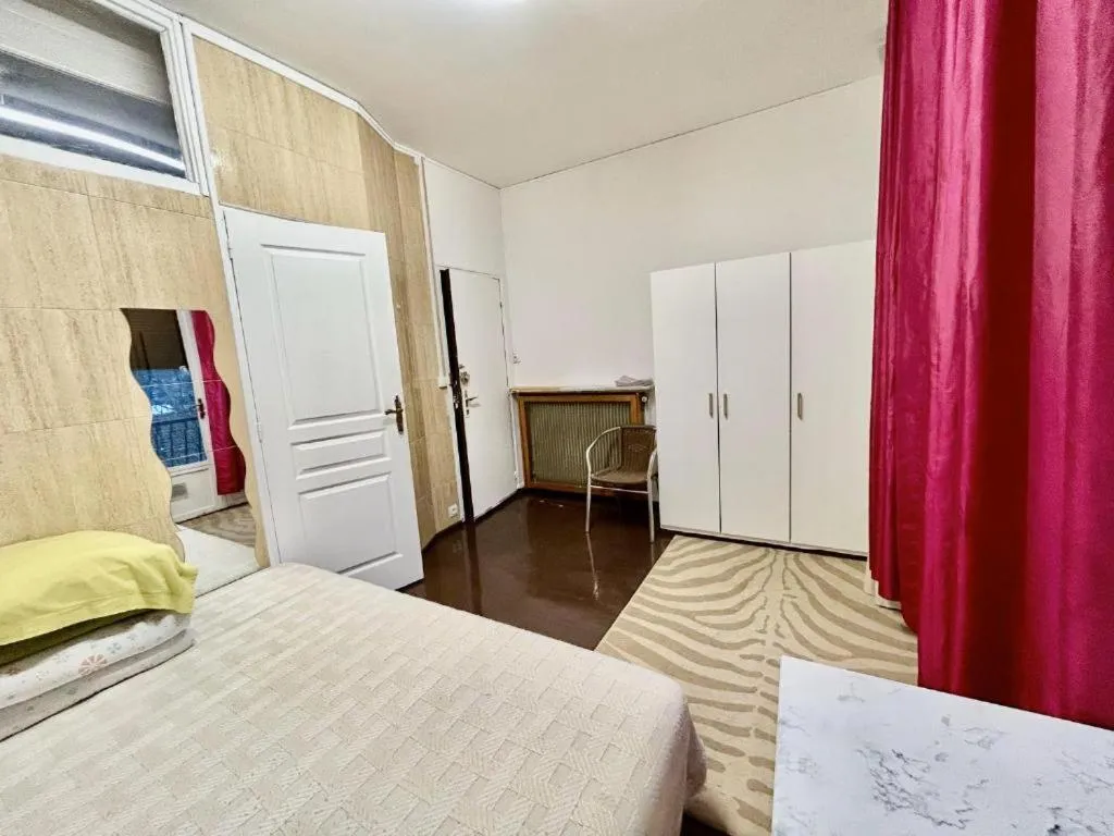 Bed in Hotel Paris Star