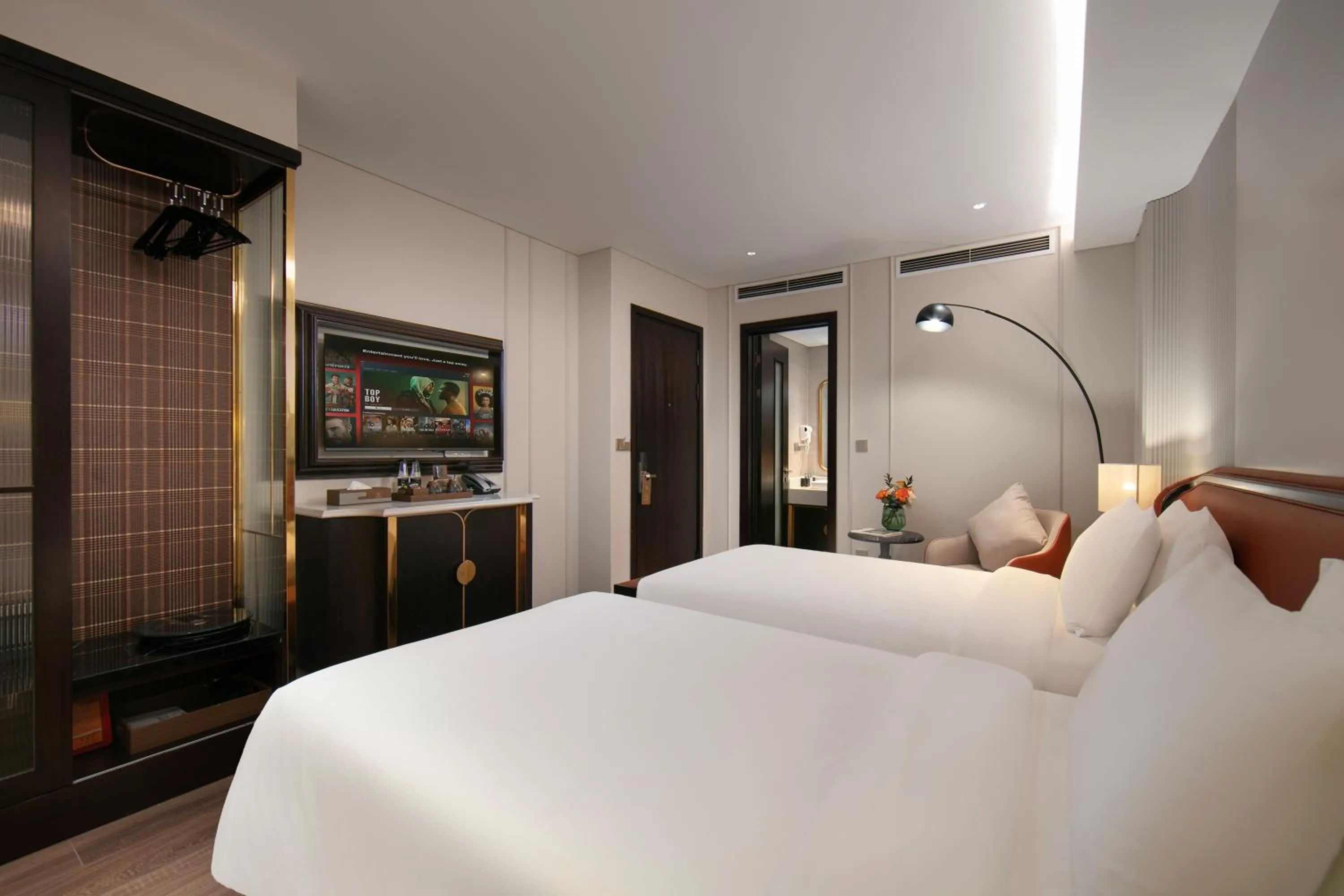 Bed in Le Premier Hotel & Rooftop Bar