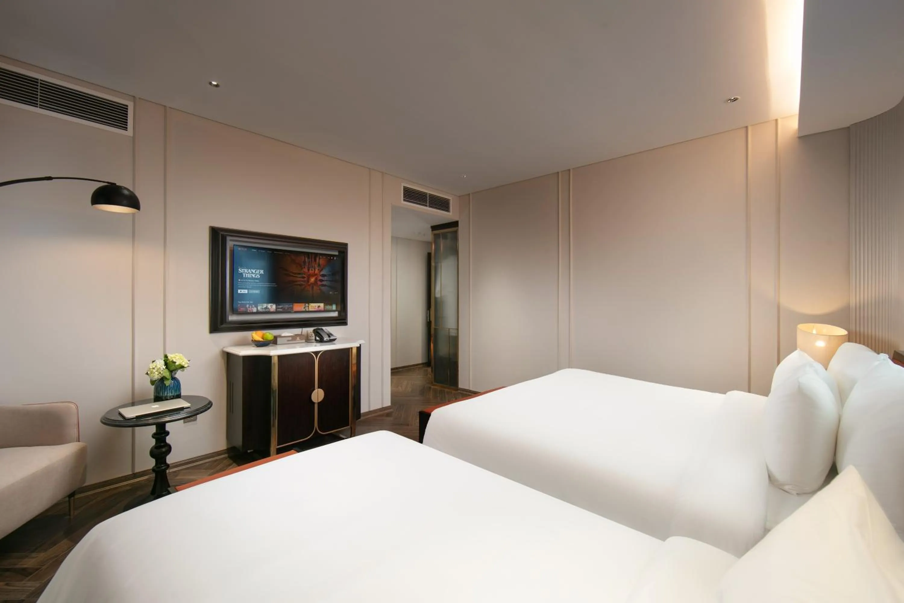 Bed in Le Premier Hotel & Rooftop Bar