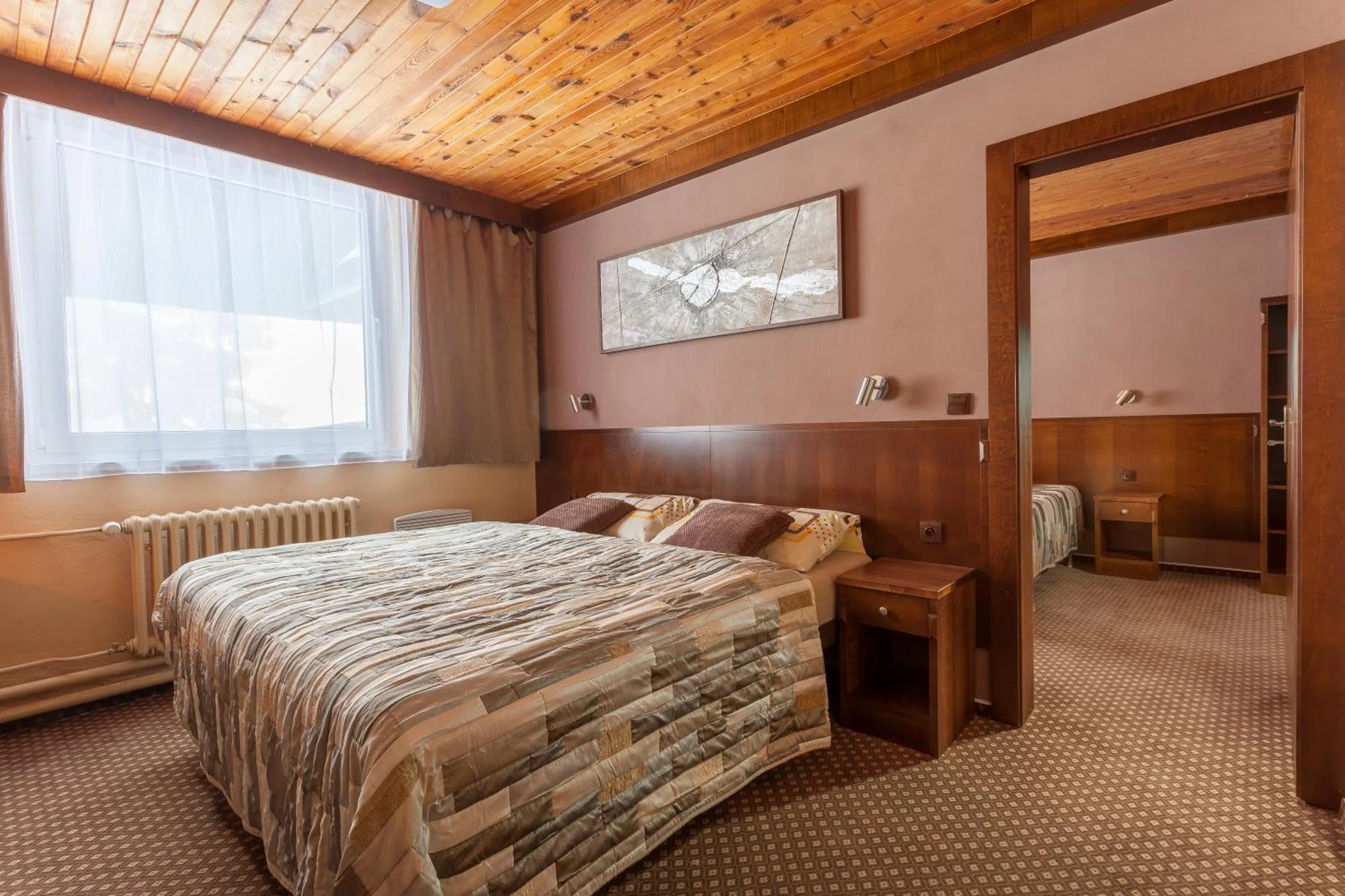 Bed in Hotel Tetřeví Boudy