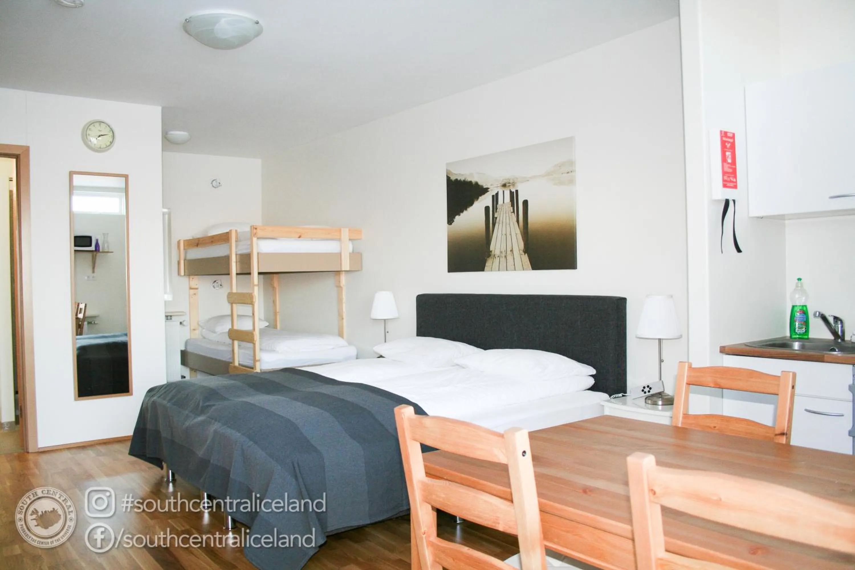 Photo of the whole room, Bed in South Central Apartments