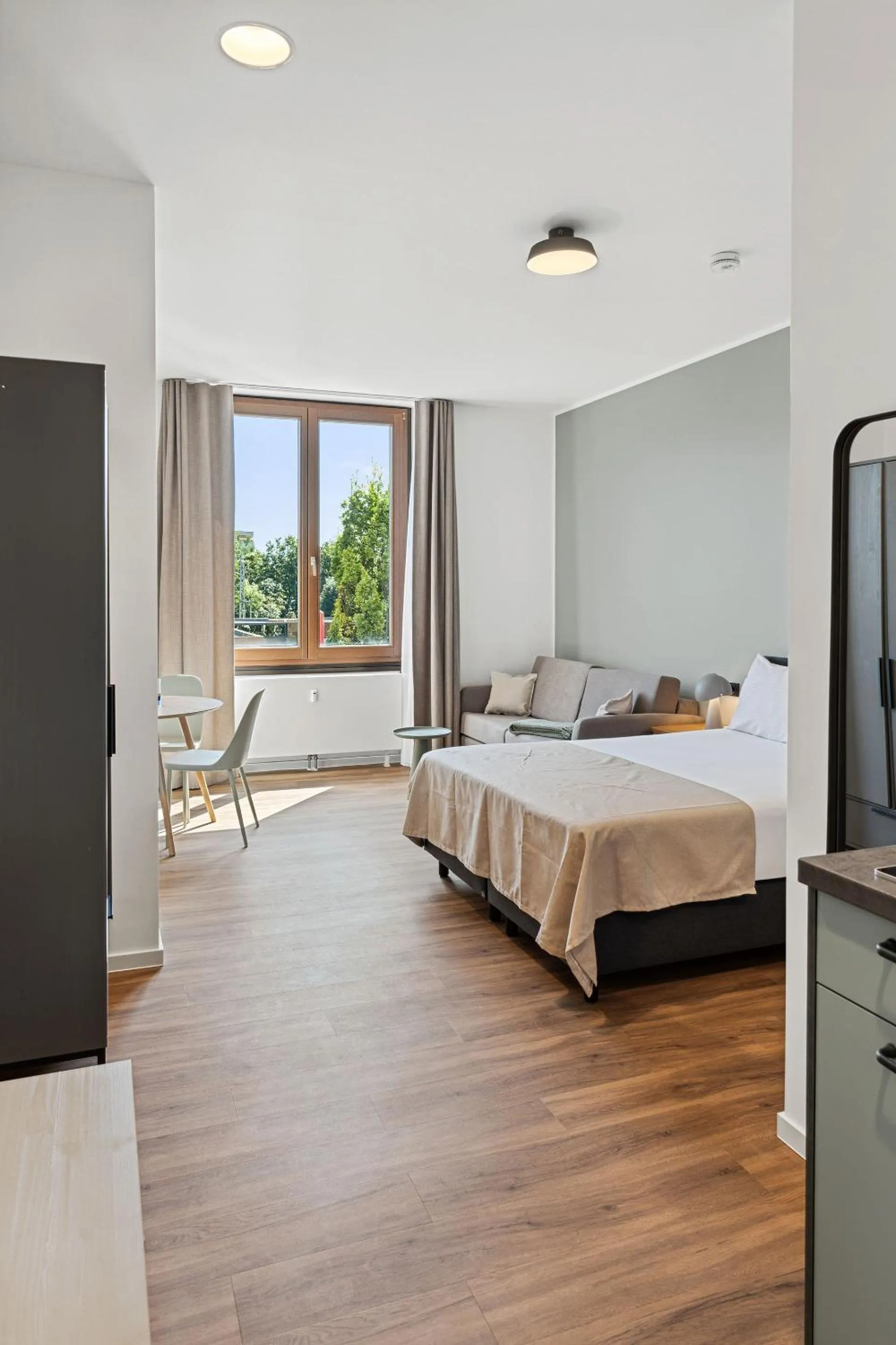 Bed in Limehome Memmingen Maximilianstraße