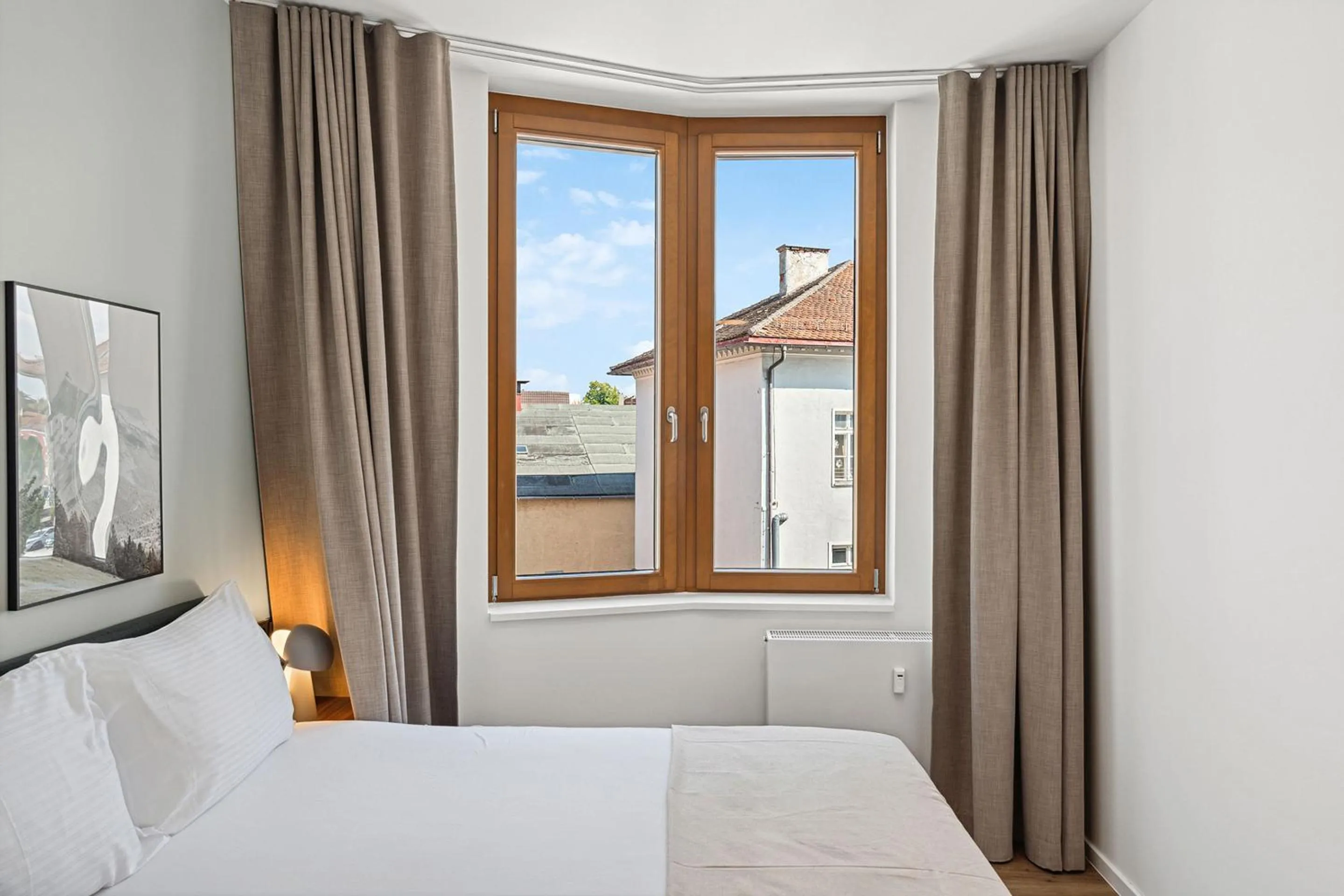 Bed in Limehome Memmingen Maximilianstraße