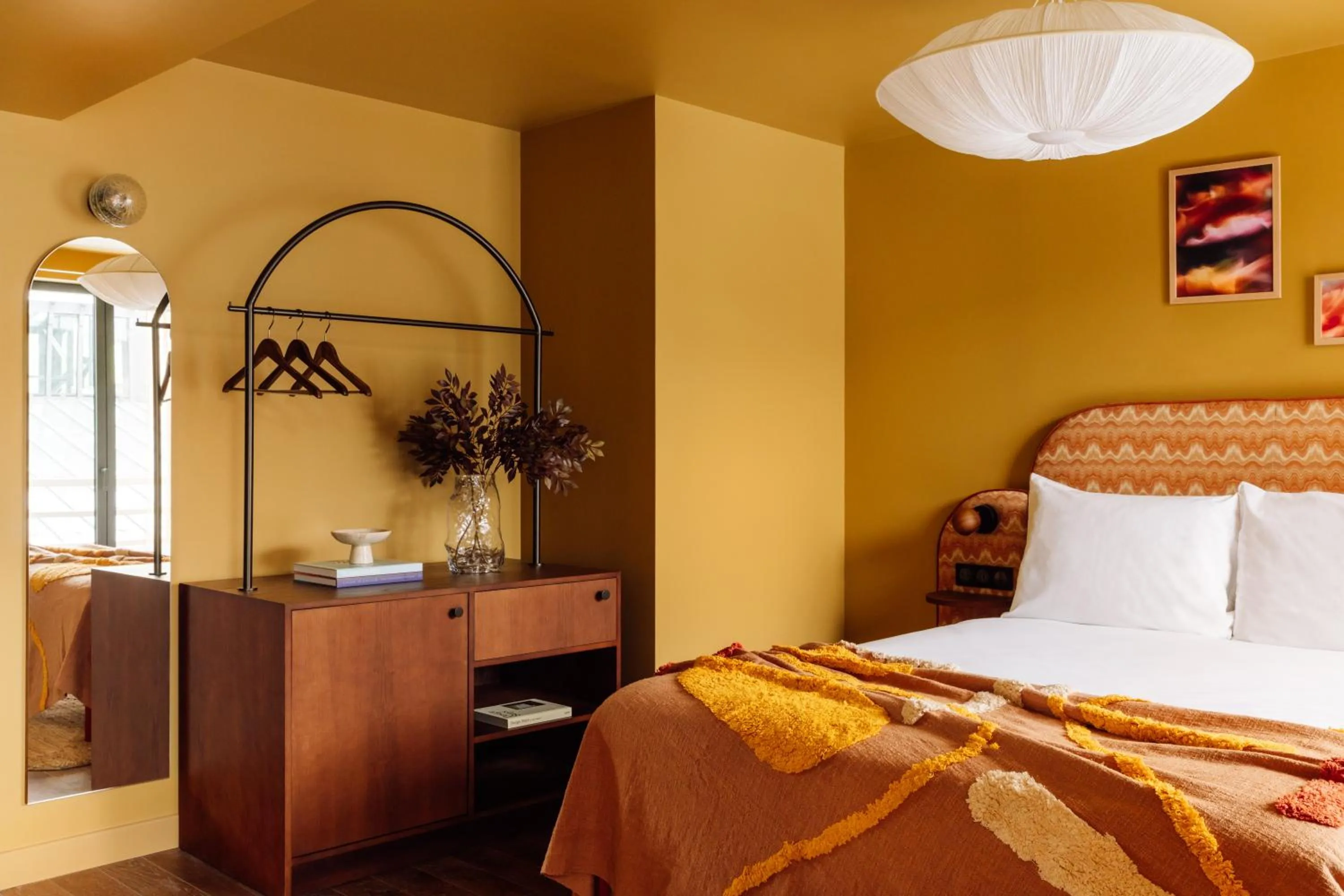 Bed in Le Jardin de Verre by Locke