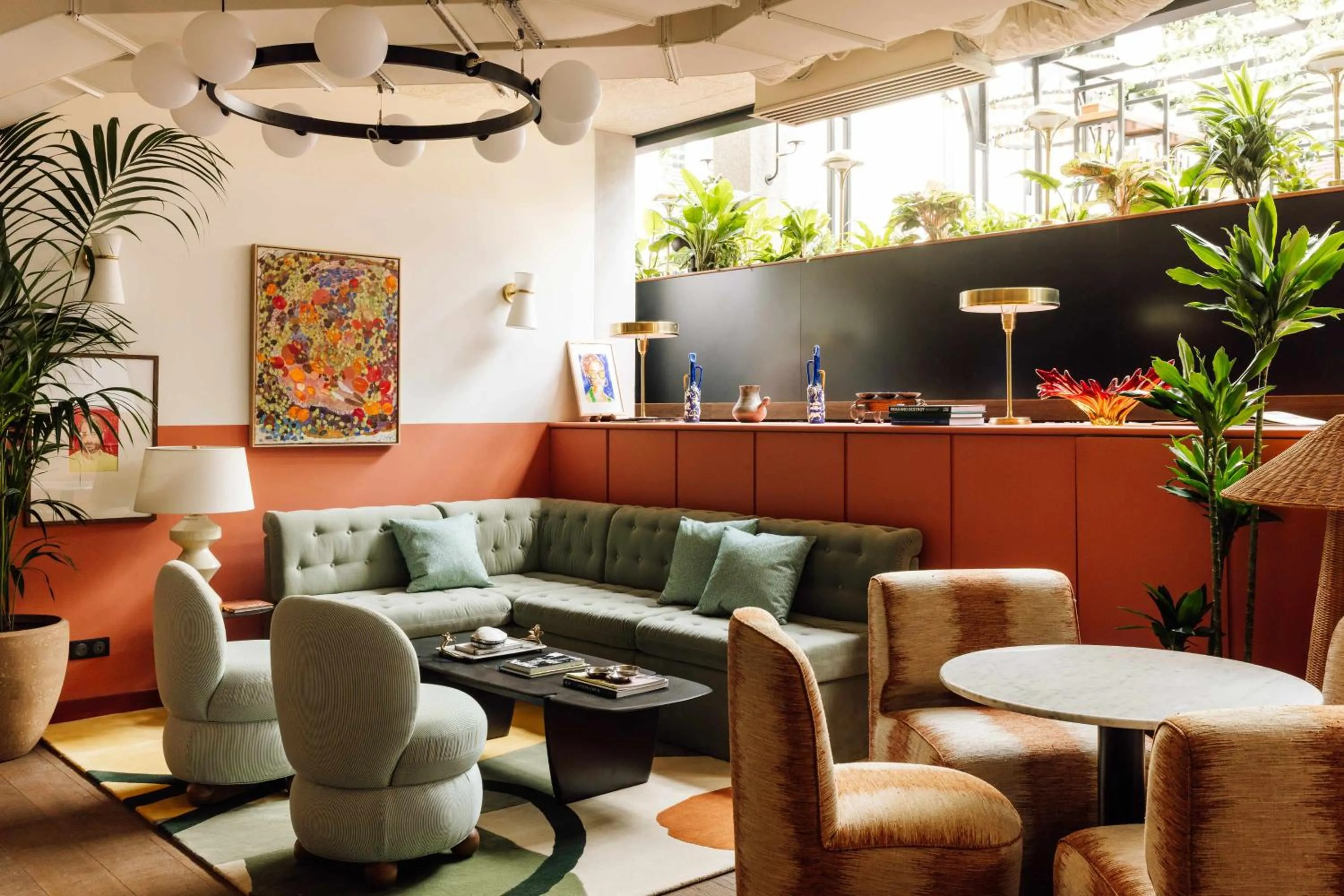 Seating area in Le Jardin de Verre by Locke