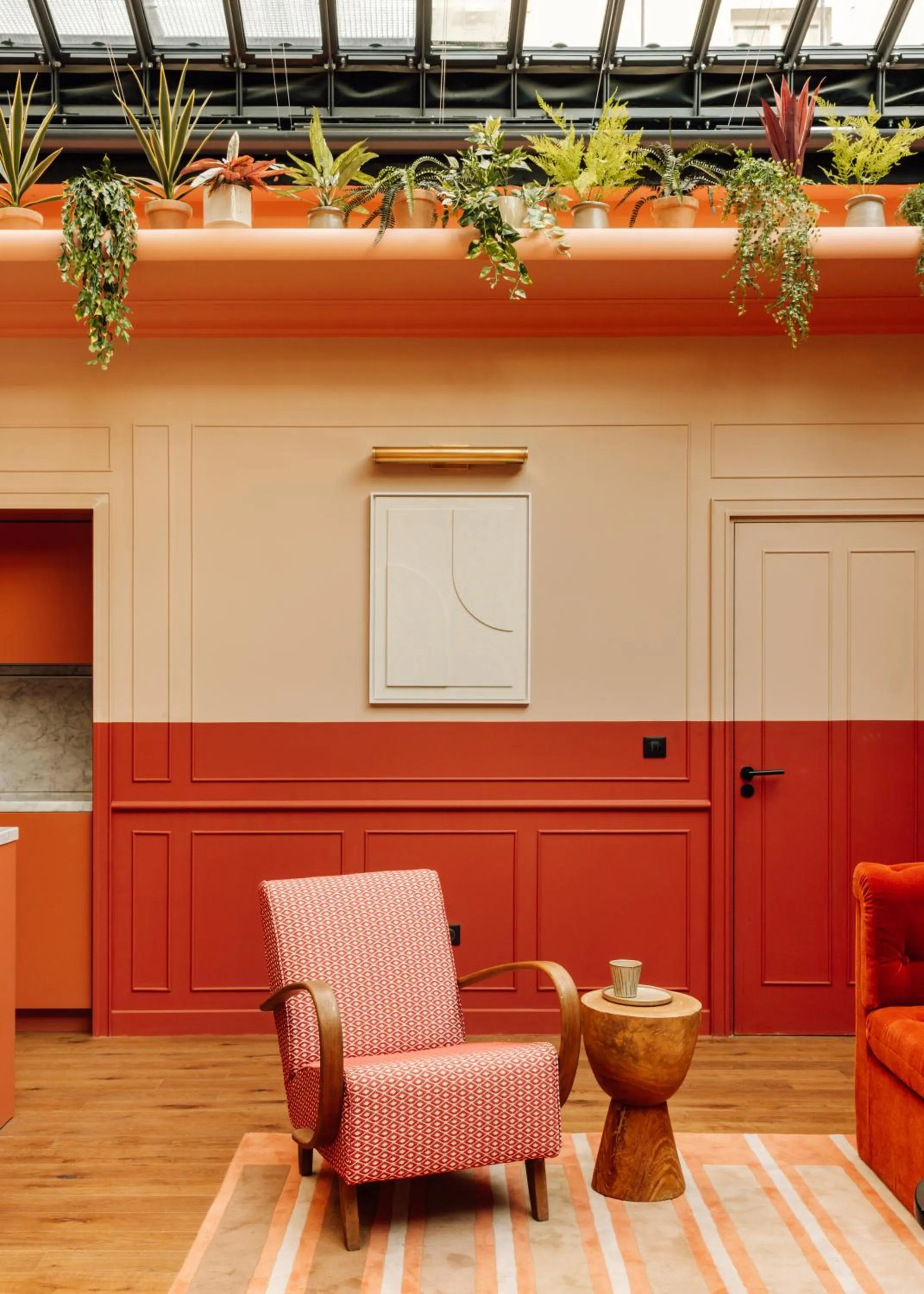 Living room in Le Jardin de Verre by Locke