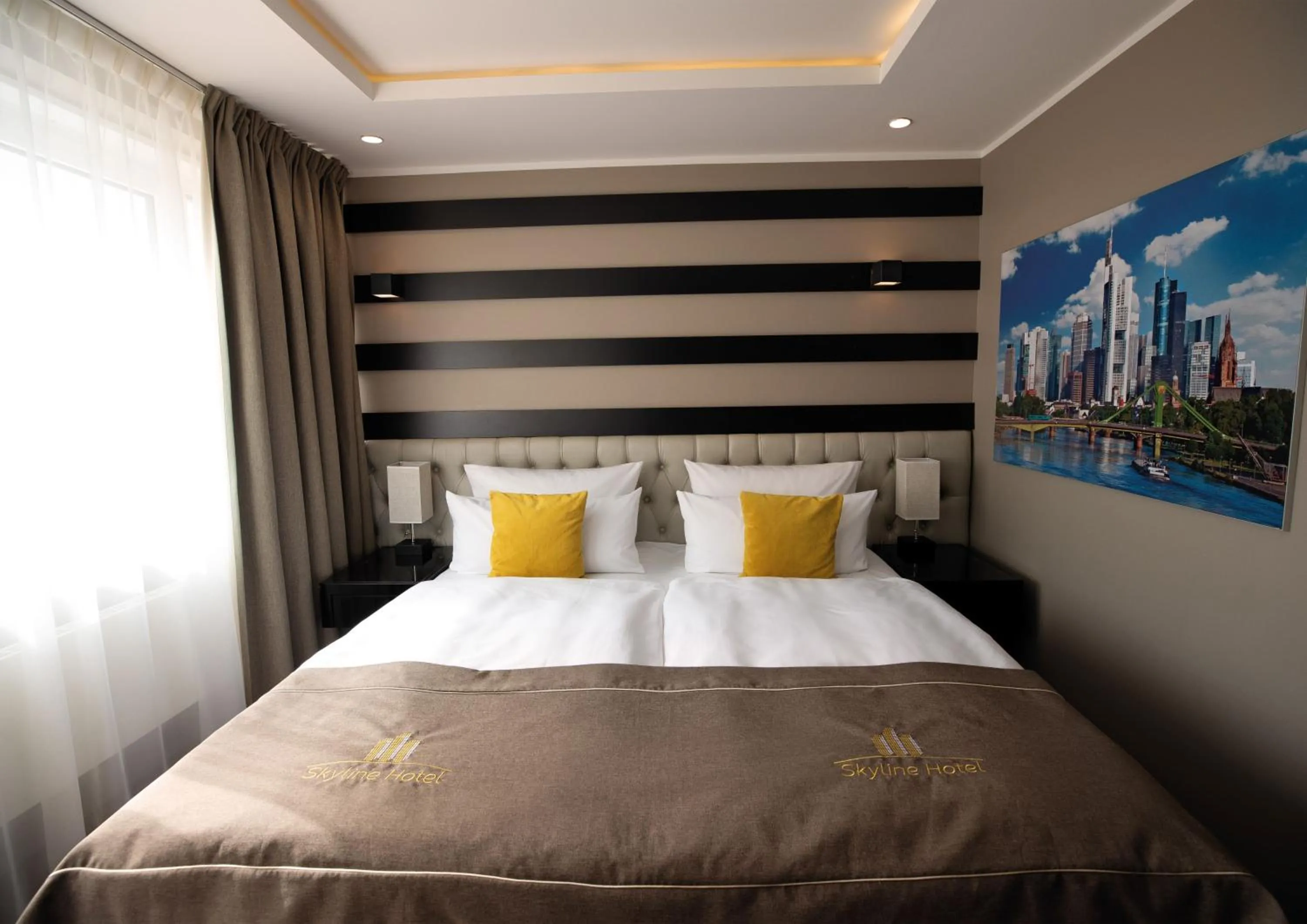 Bed in Skyline Hotel City Frankfurt