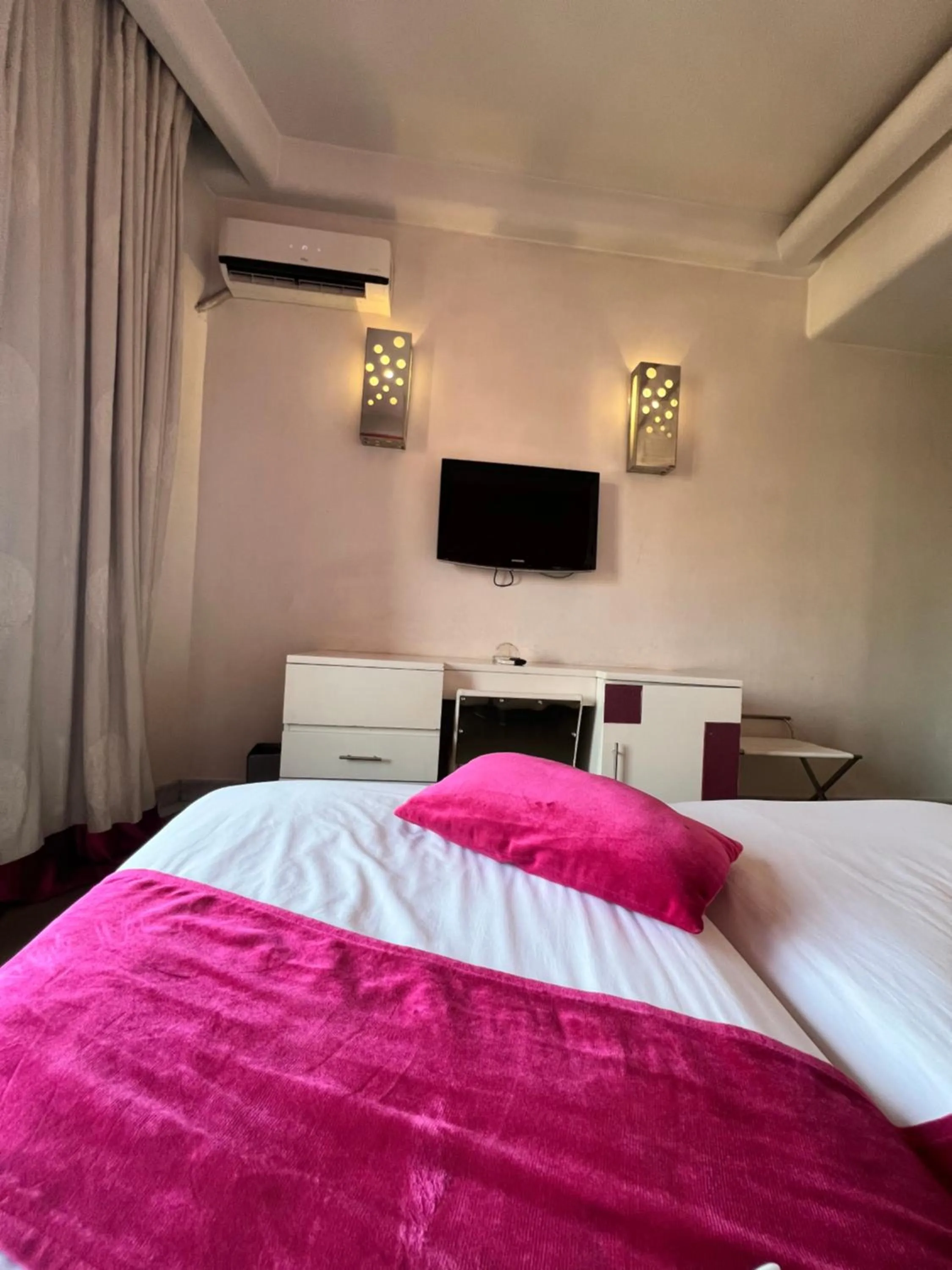 Bed in La Renaissance hôtel Marrakech