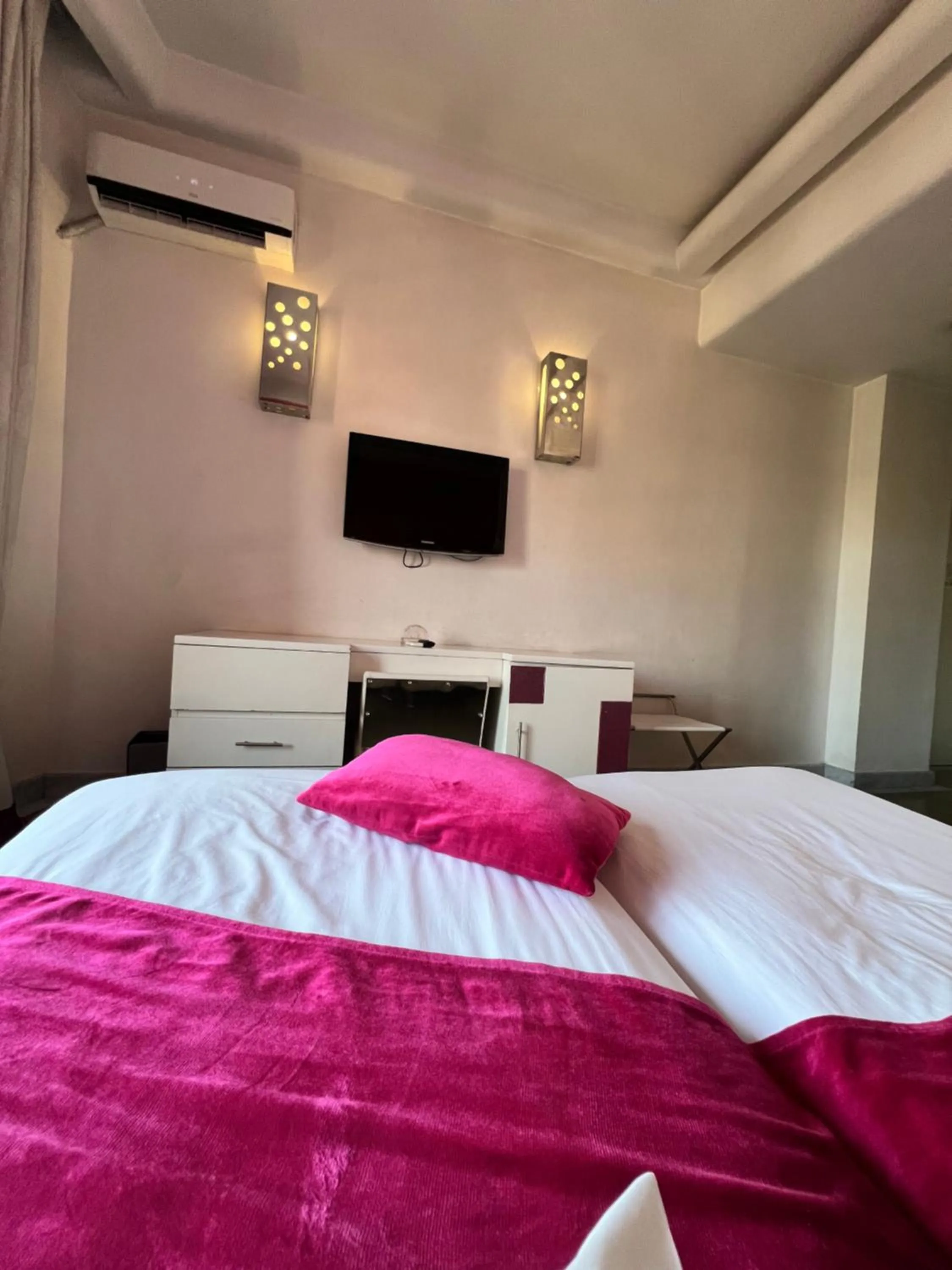 Bed in La Renaissance hôtel Marrakech