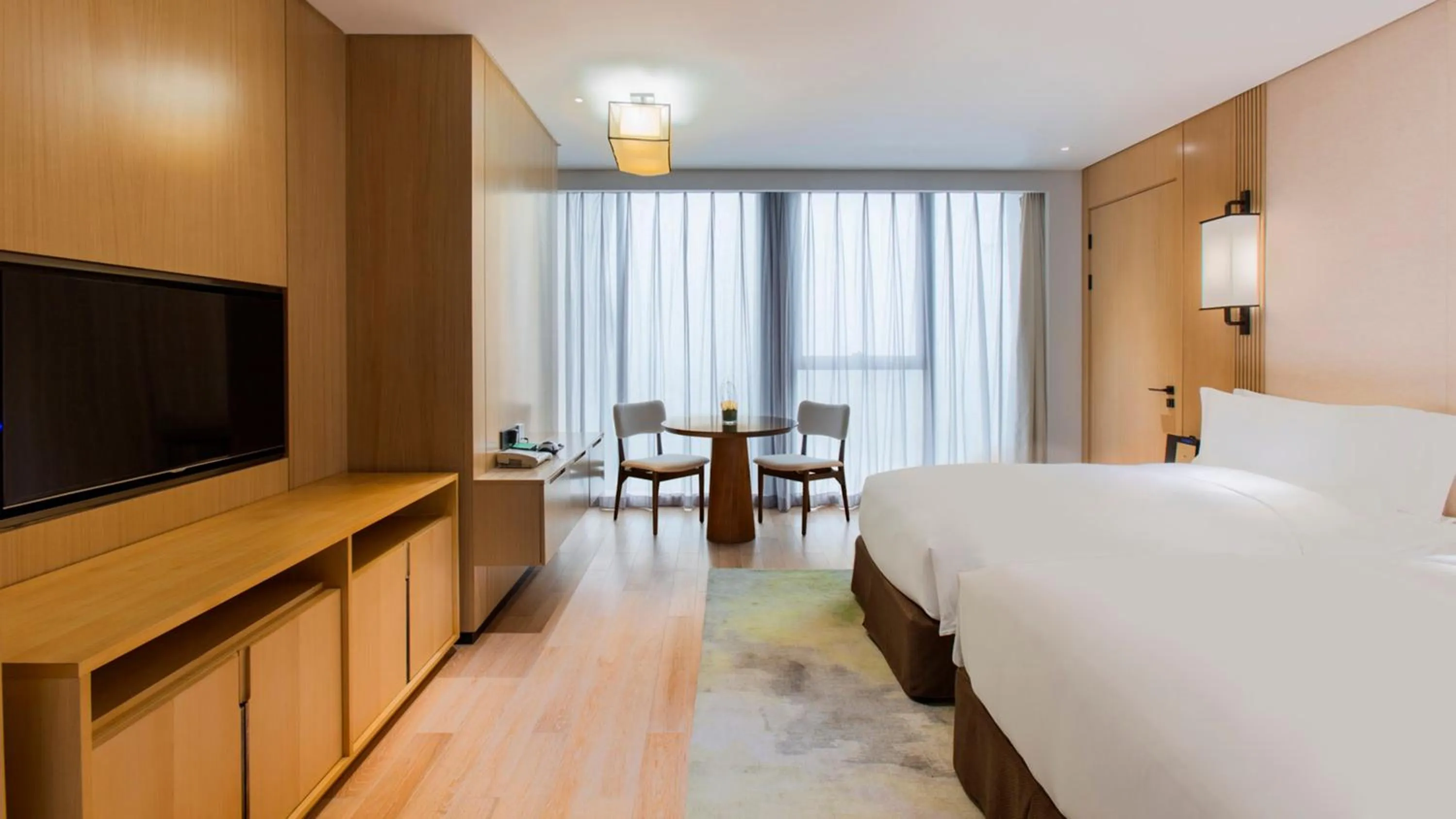 Photo of the whole room, Bed in Holiday Inn Nanjing Qinhuai South Suites by IHG