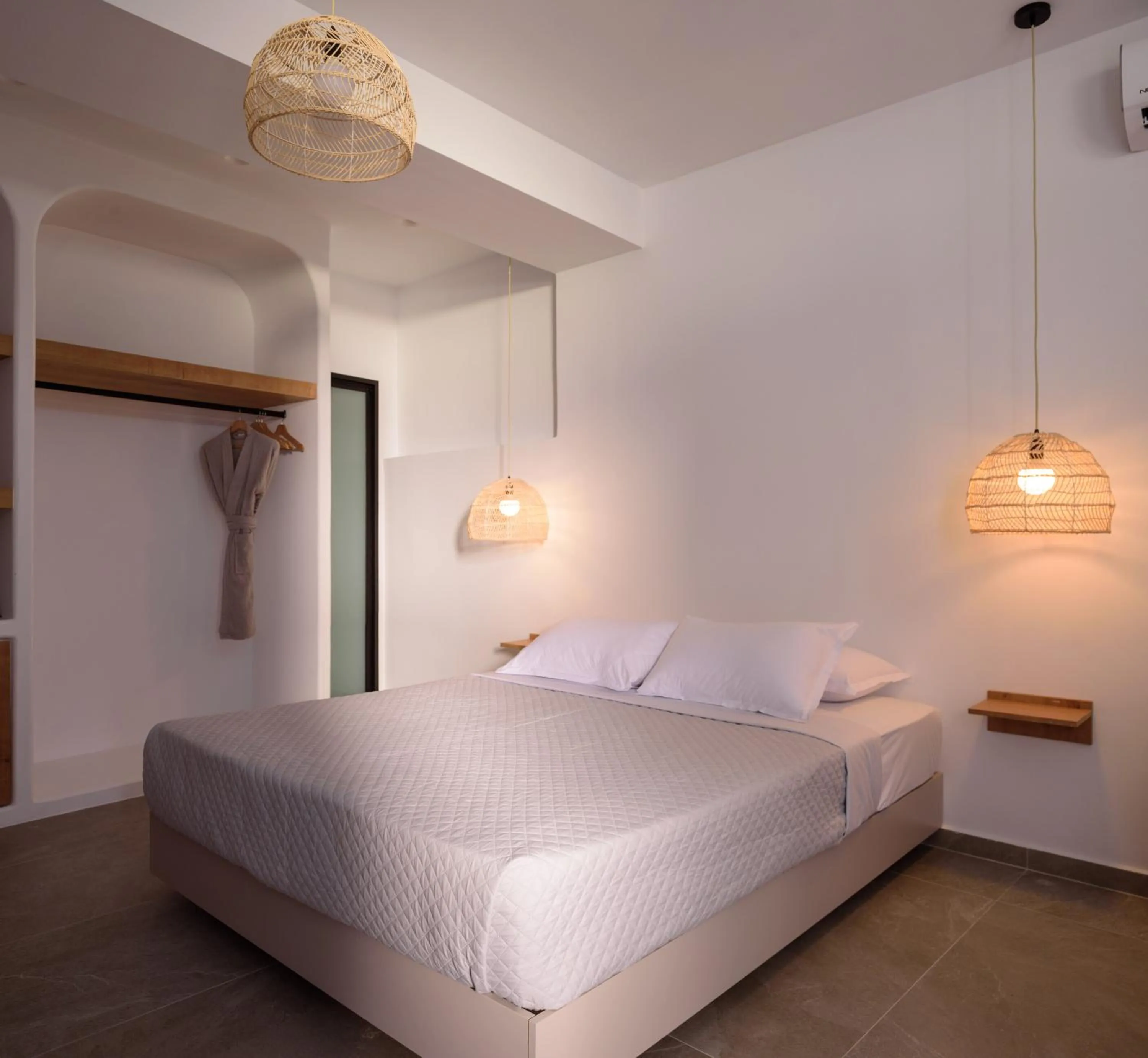 Bed in Elia Caldera Suites