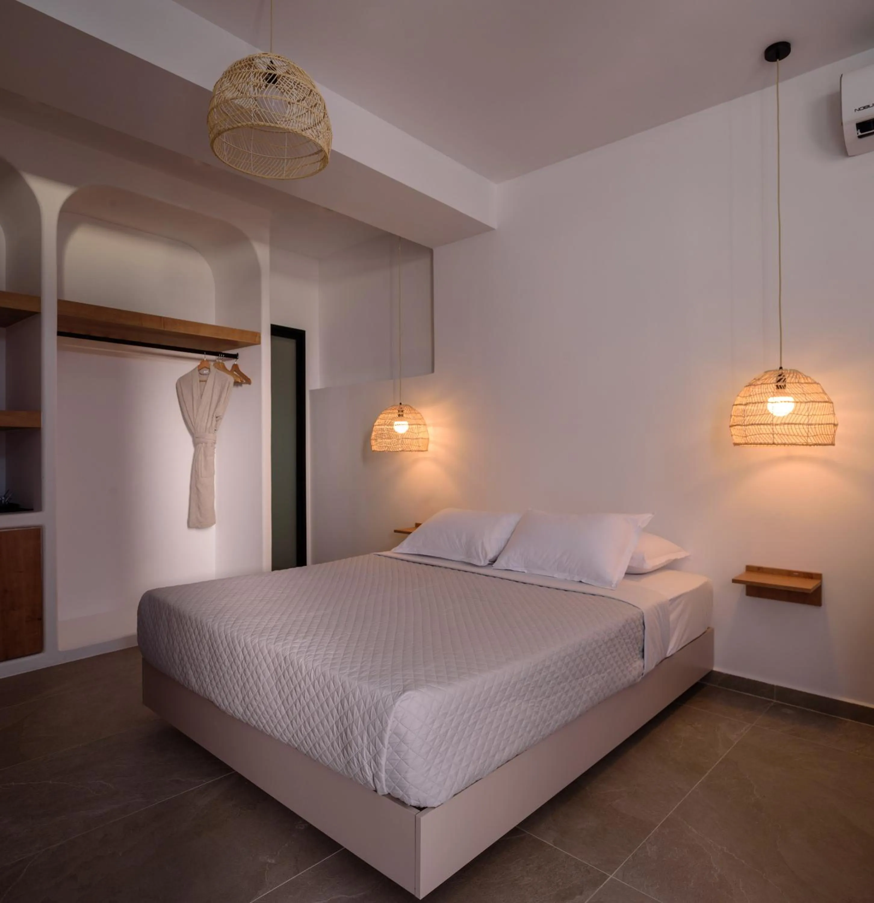 Bed in Elia Caldera Suites