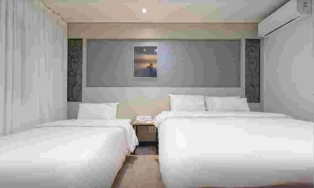 Bed in Curve Hotel Iksan