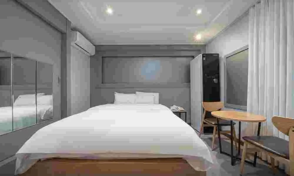 Bed in Curve Hotel Iksan