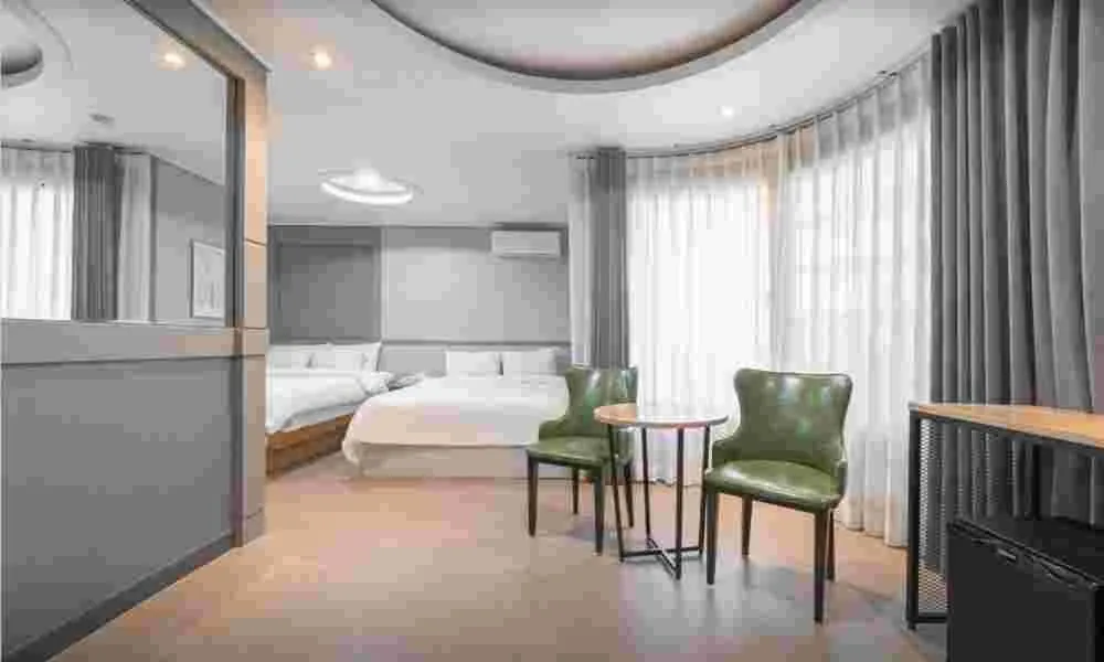 Bed in Curve Hotel Iksan