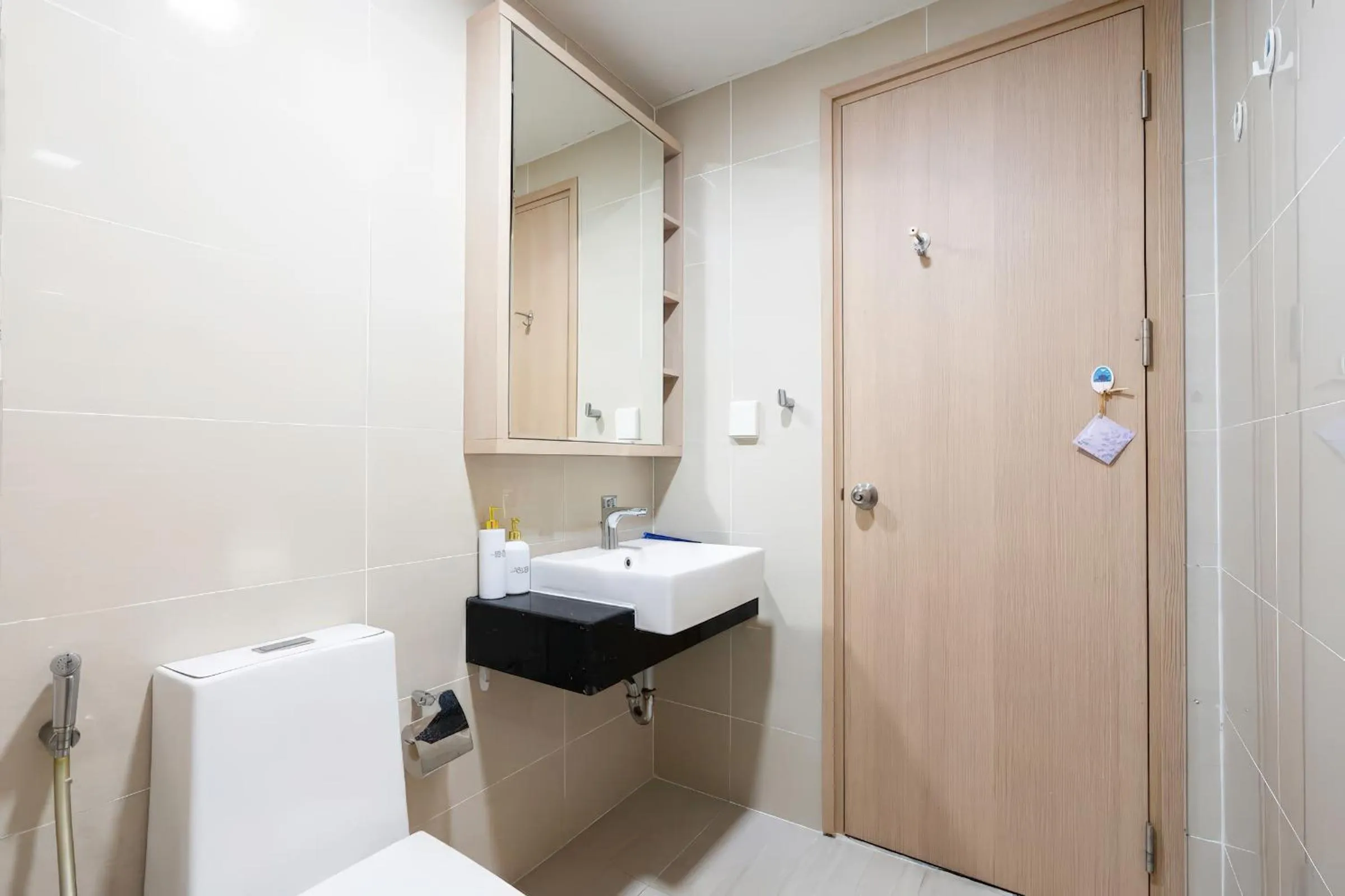 Toilet in RAINBOW Sky Center TSN Airport