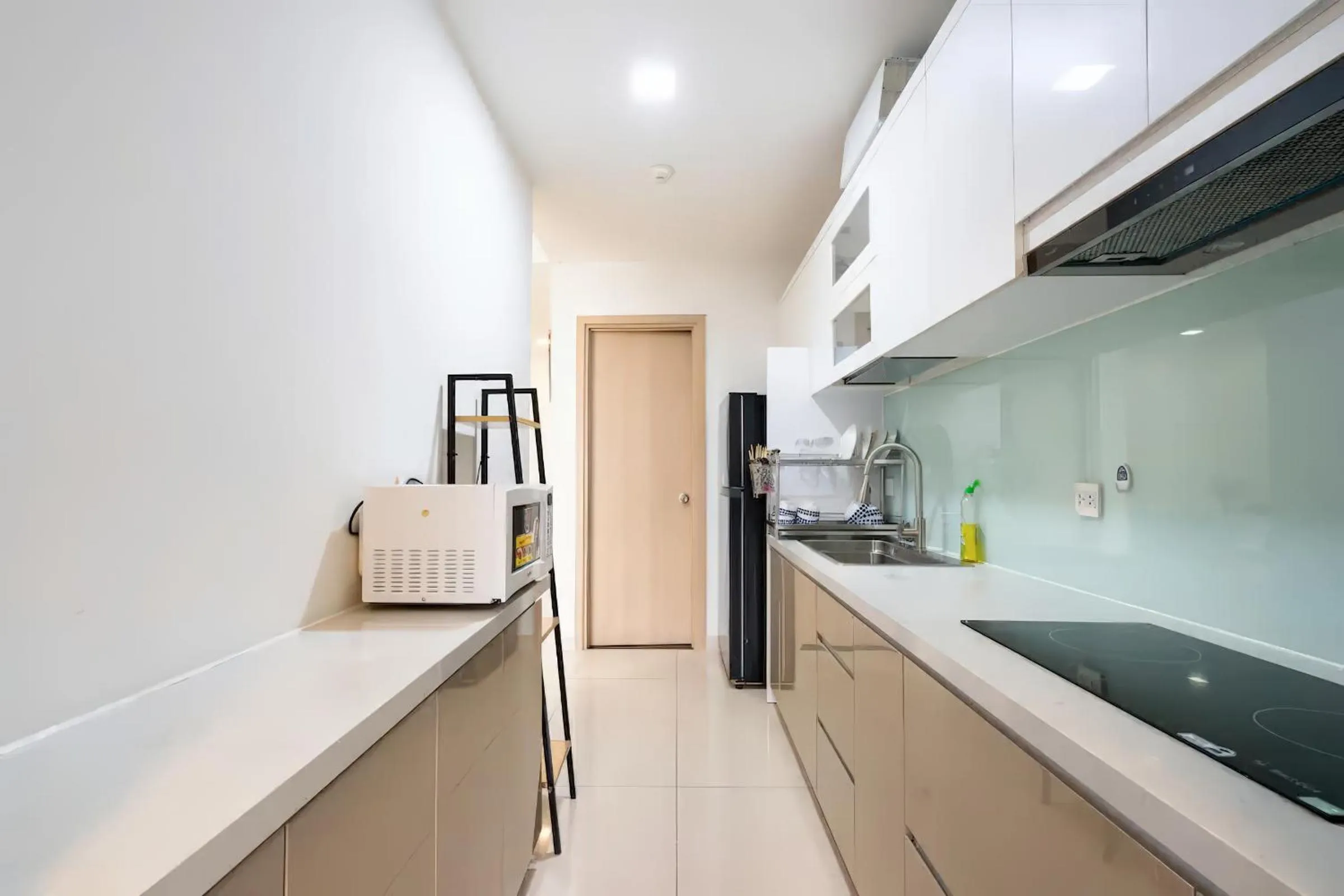 Kitchen or kitchenette in RAINBOW Sky Center TSN Airport