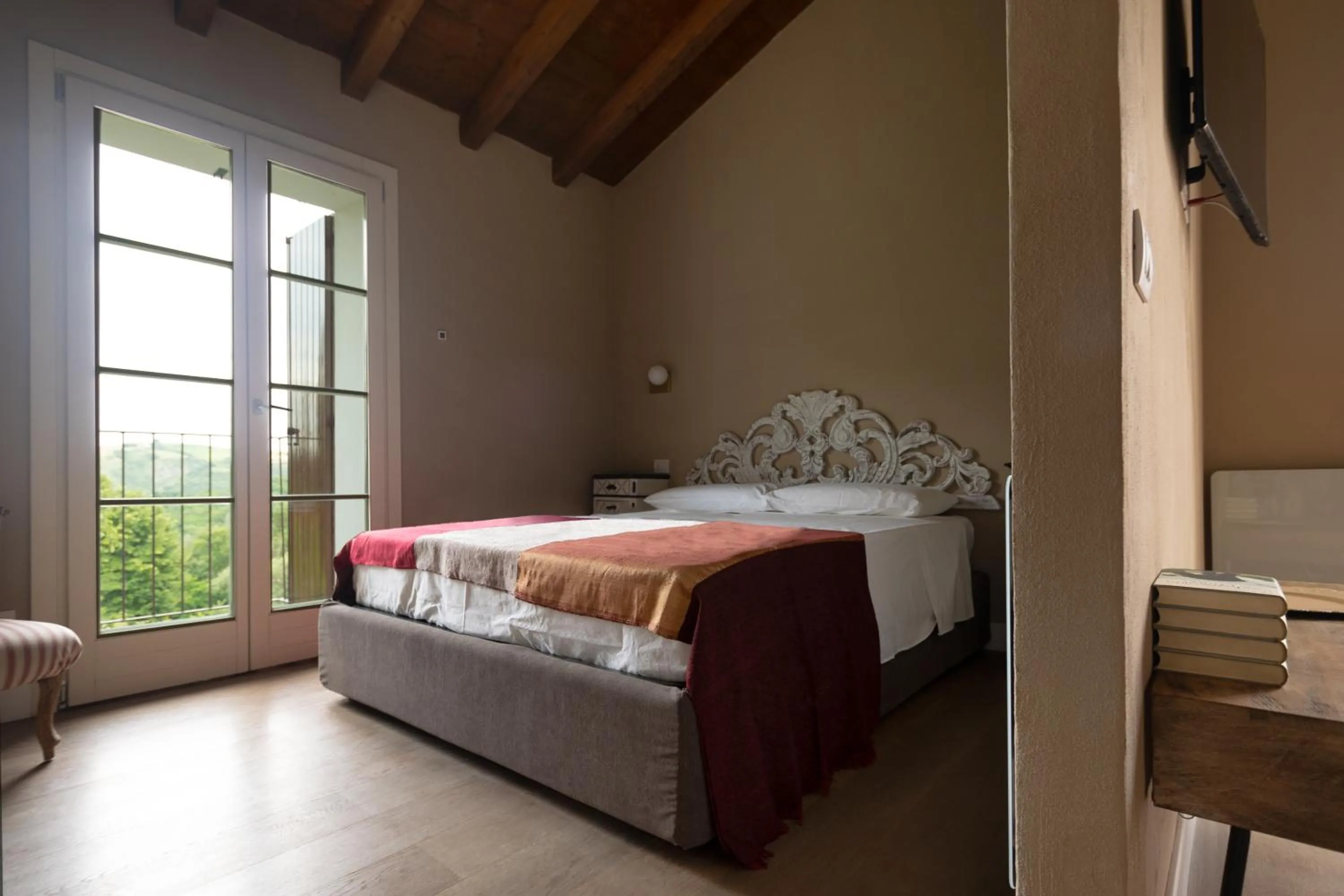 Bed in Luce Boutique Hotel