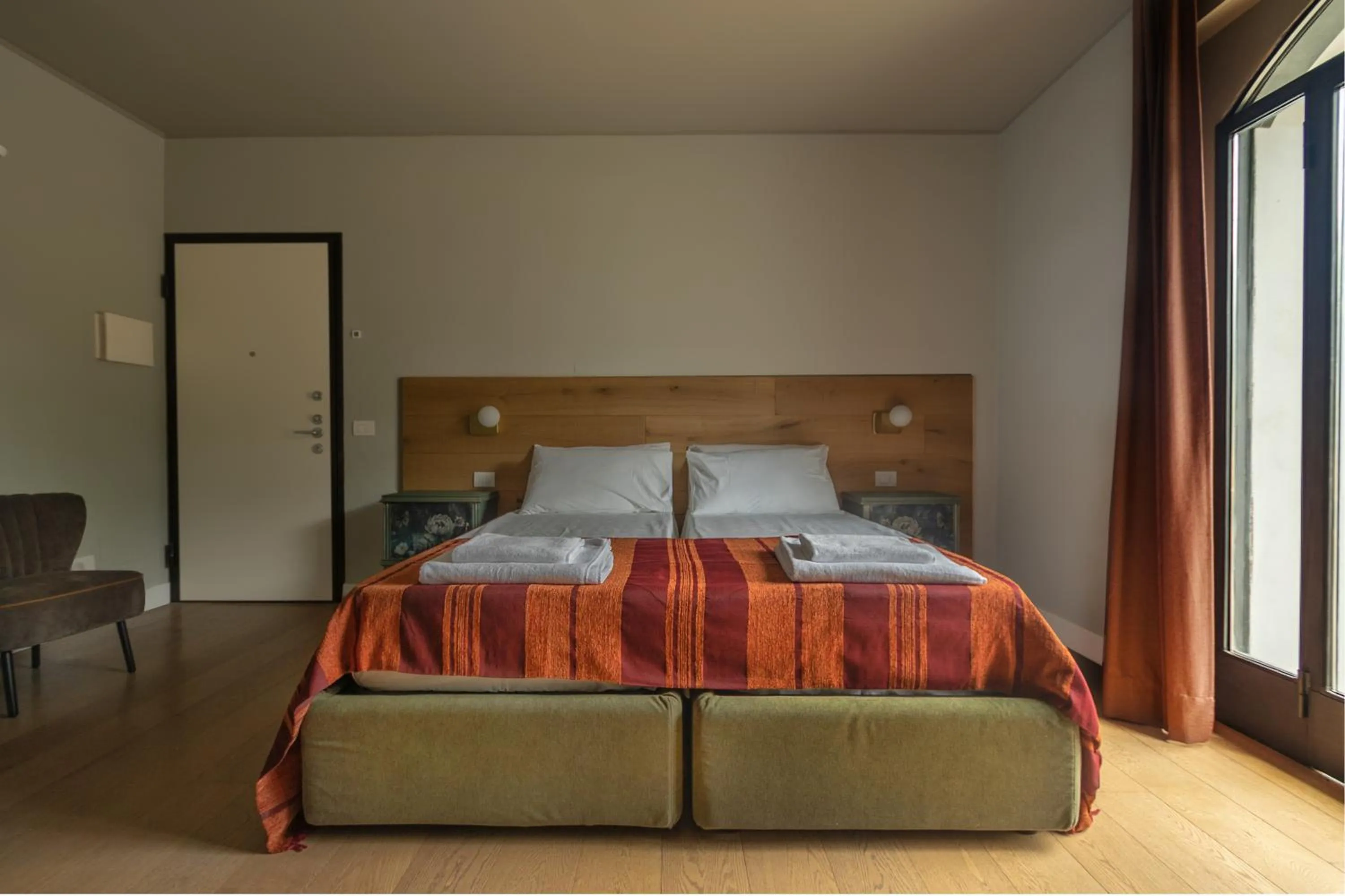 Bed in Luce Boutique Hotel