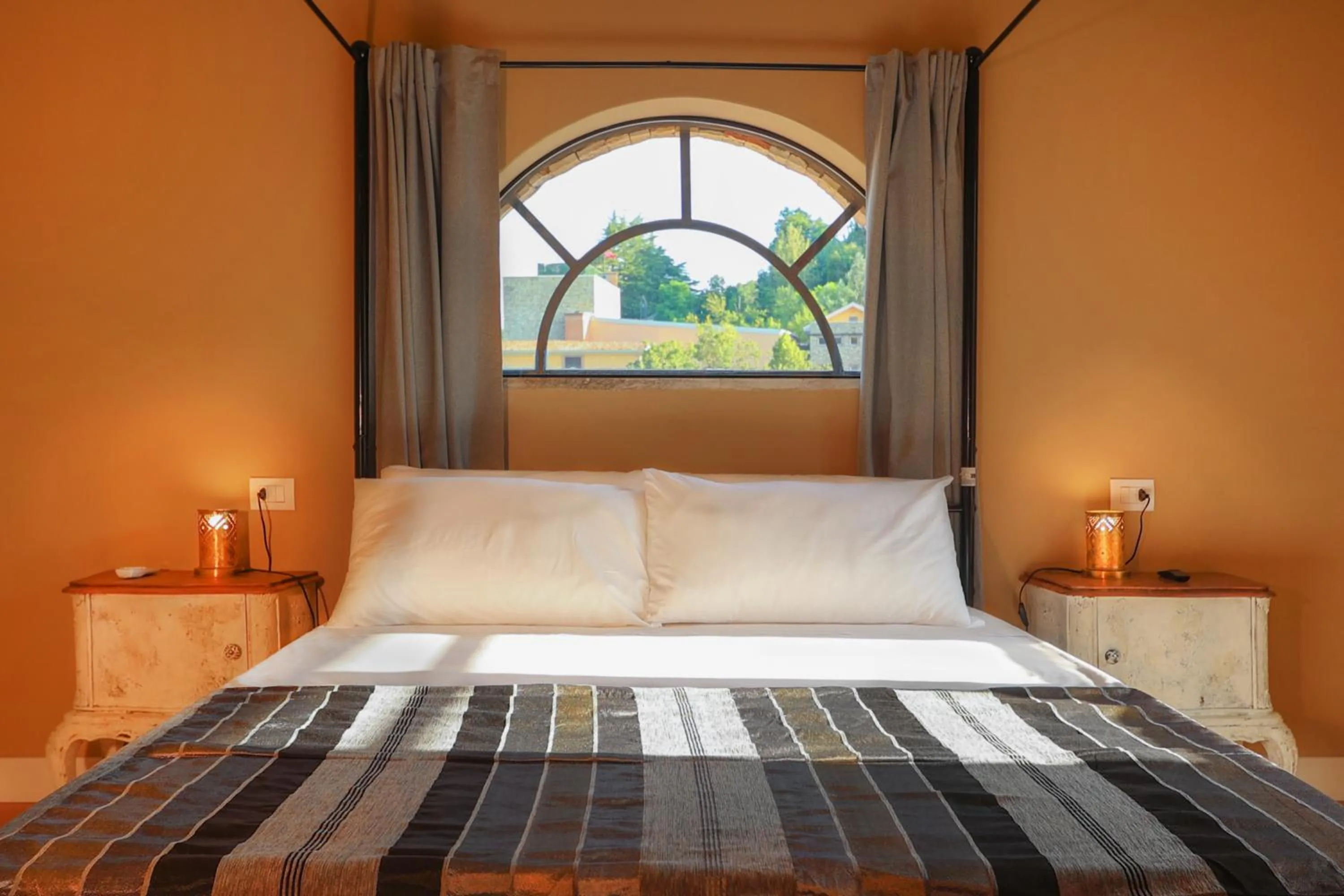 Bed in Luce Boutique Hotel