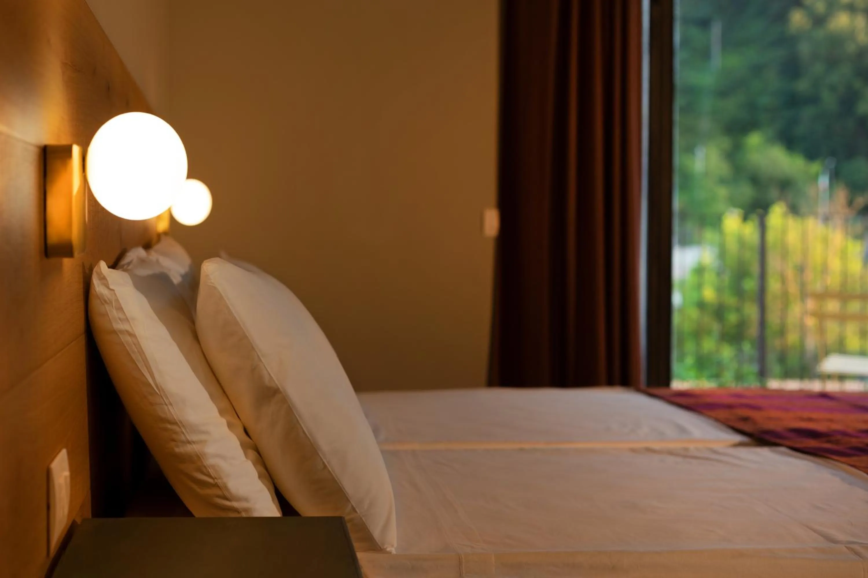 Bed in Luce Boutique Hotel