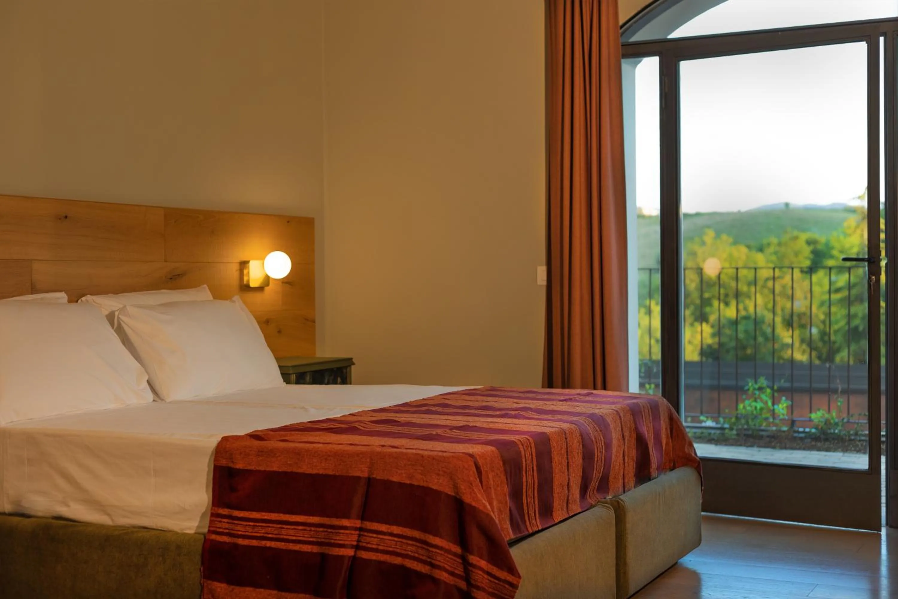 Bed in Luce Boutique Hotel