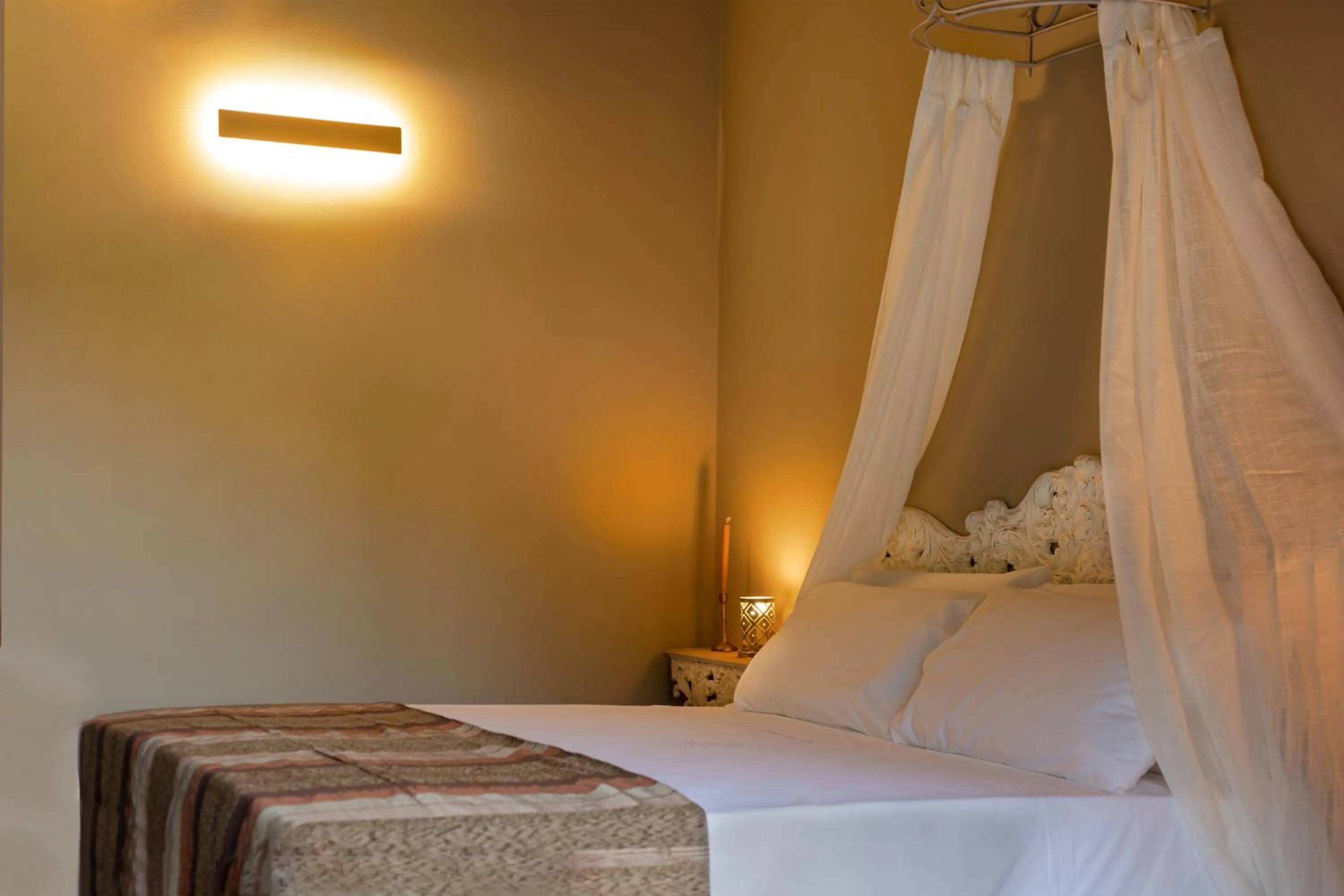 Bed in Luce Boutique Hotel