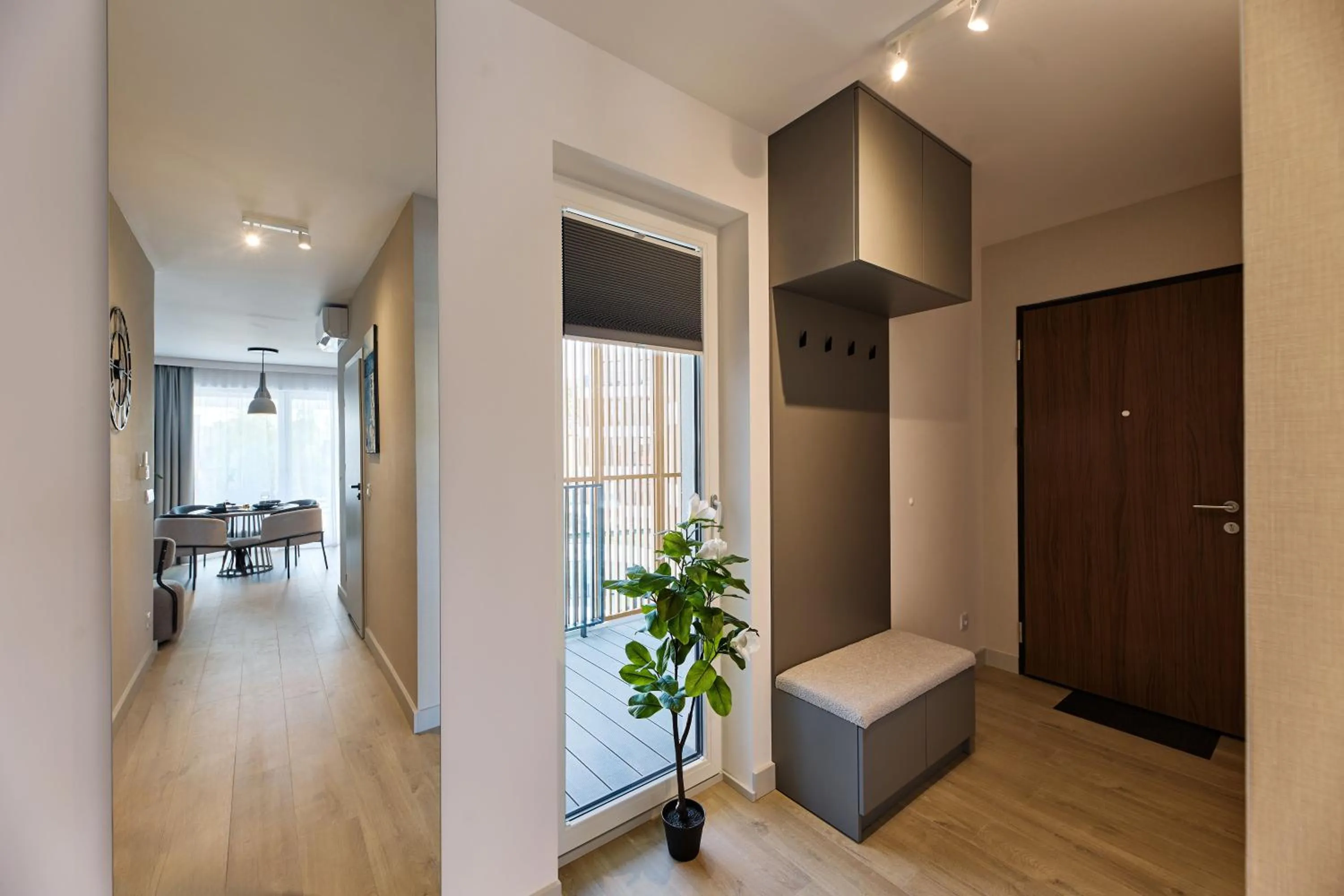 Living room, Bed in Resort Baltic Waves Apartments - Pool & Spa