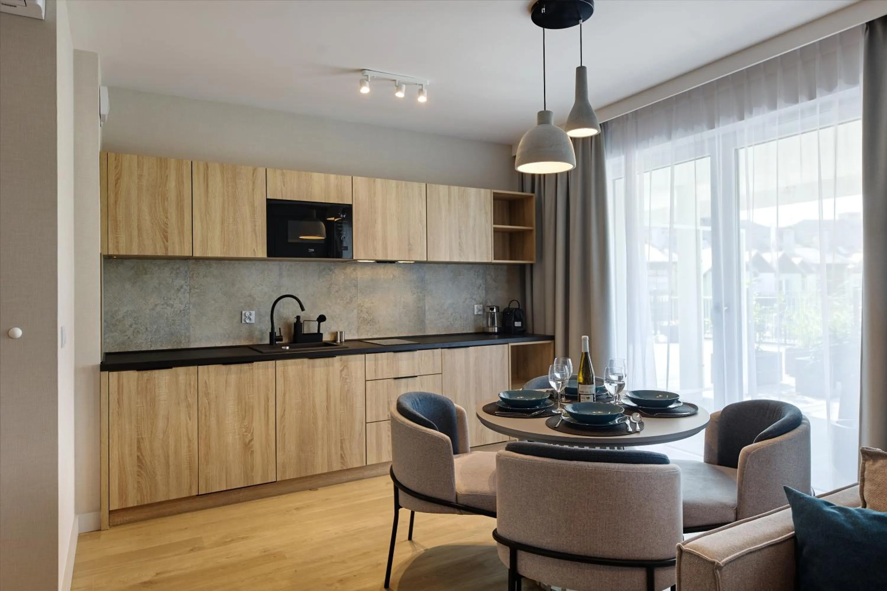 Kitchen or kitchenette in Resort Baltic Waves Apartments - Pool & Spa